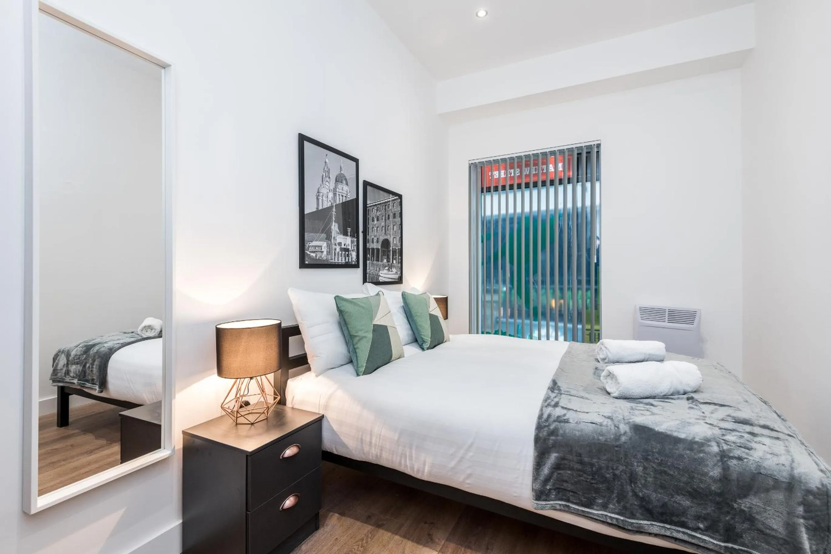 Bed in SGT Peppers Mathew Street Apartments By Happy Days