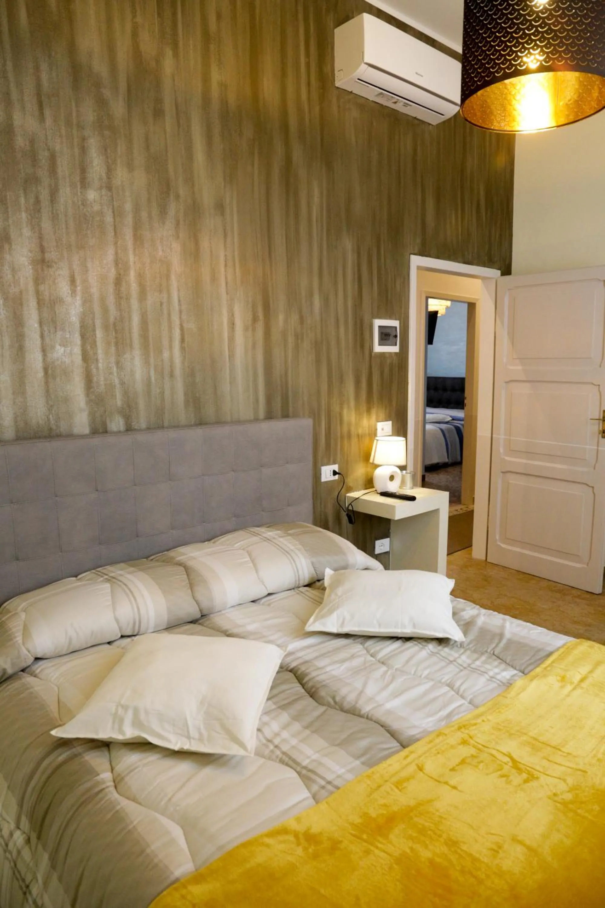 Bed in Ad Astra Rooms