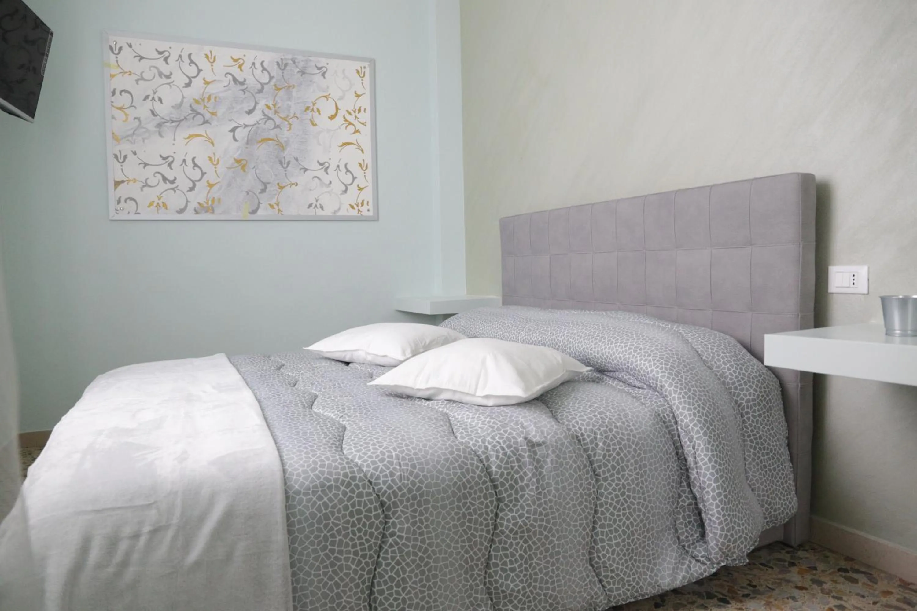 Bed in Ad Astra Rooms