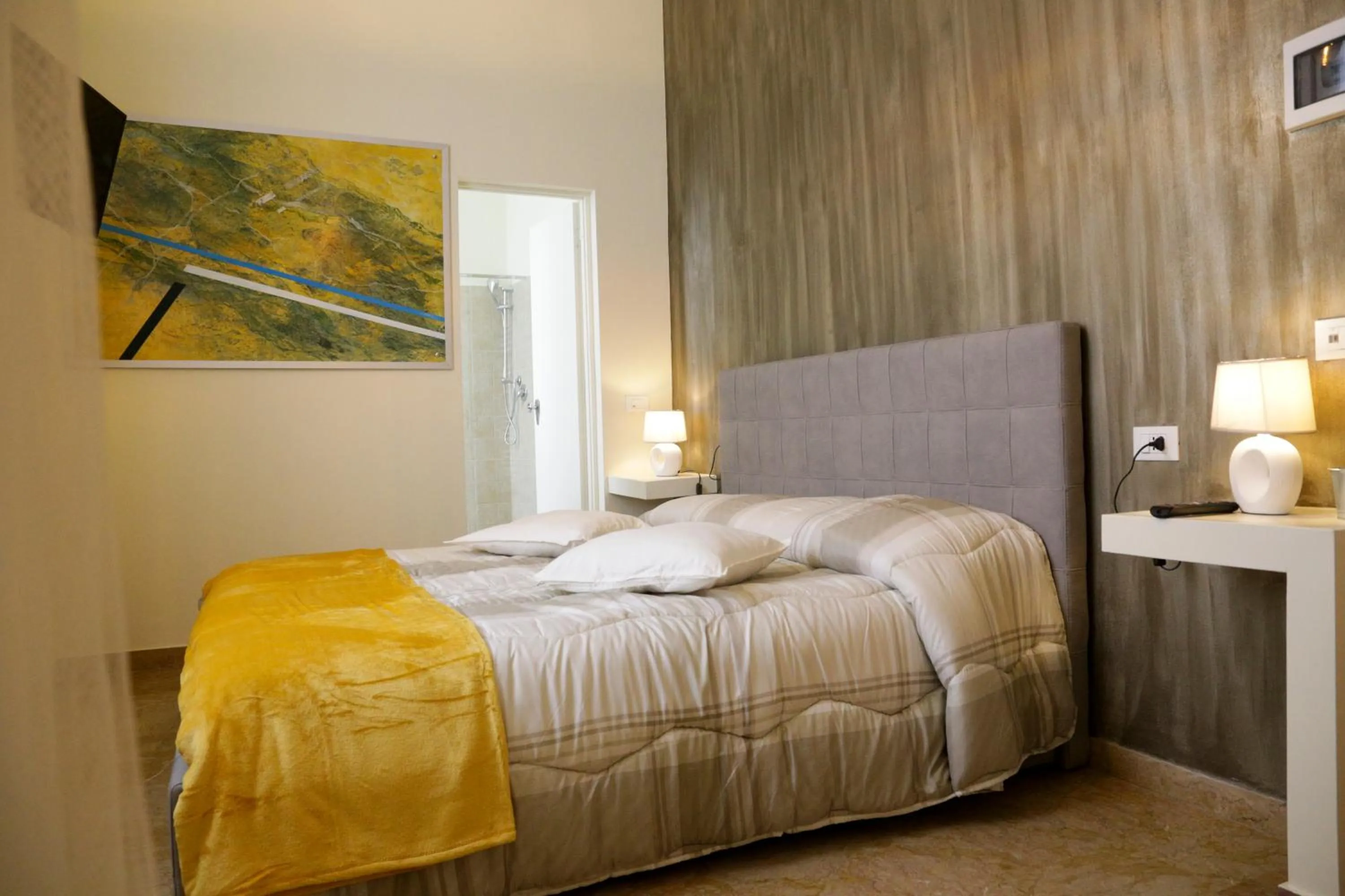 Bed in Ad Astra Rooms