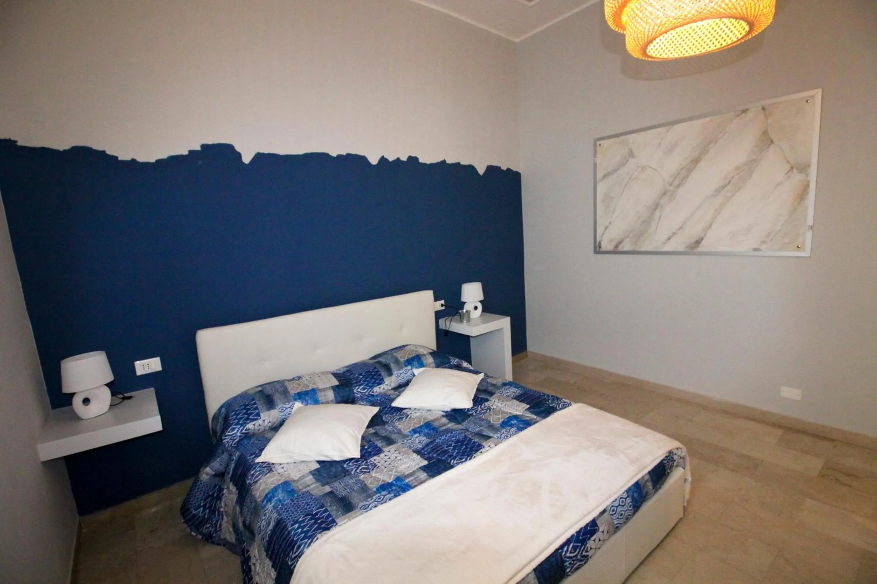 Bed in Ad Astra Rooms