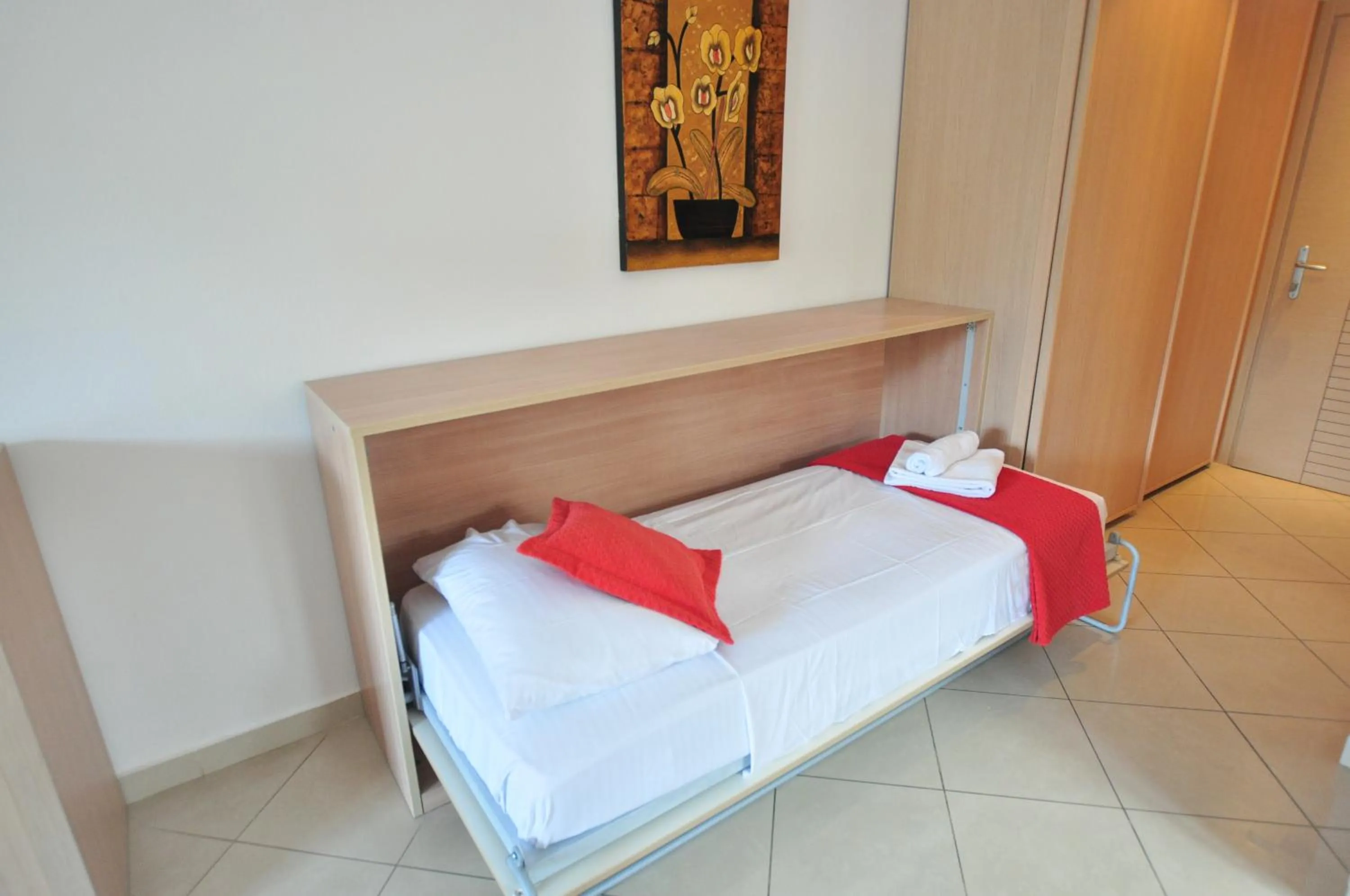 Bed in Michelangelo Resort