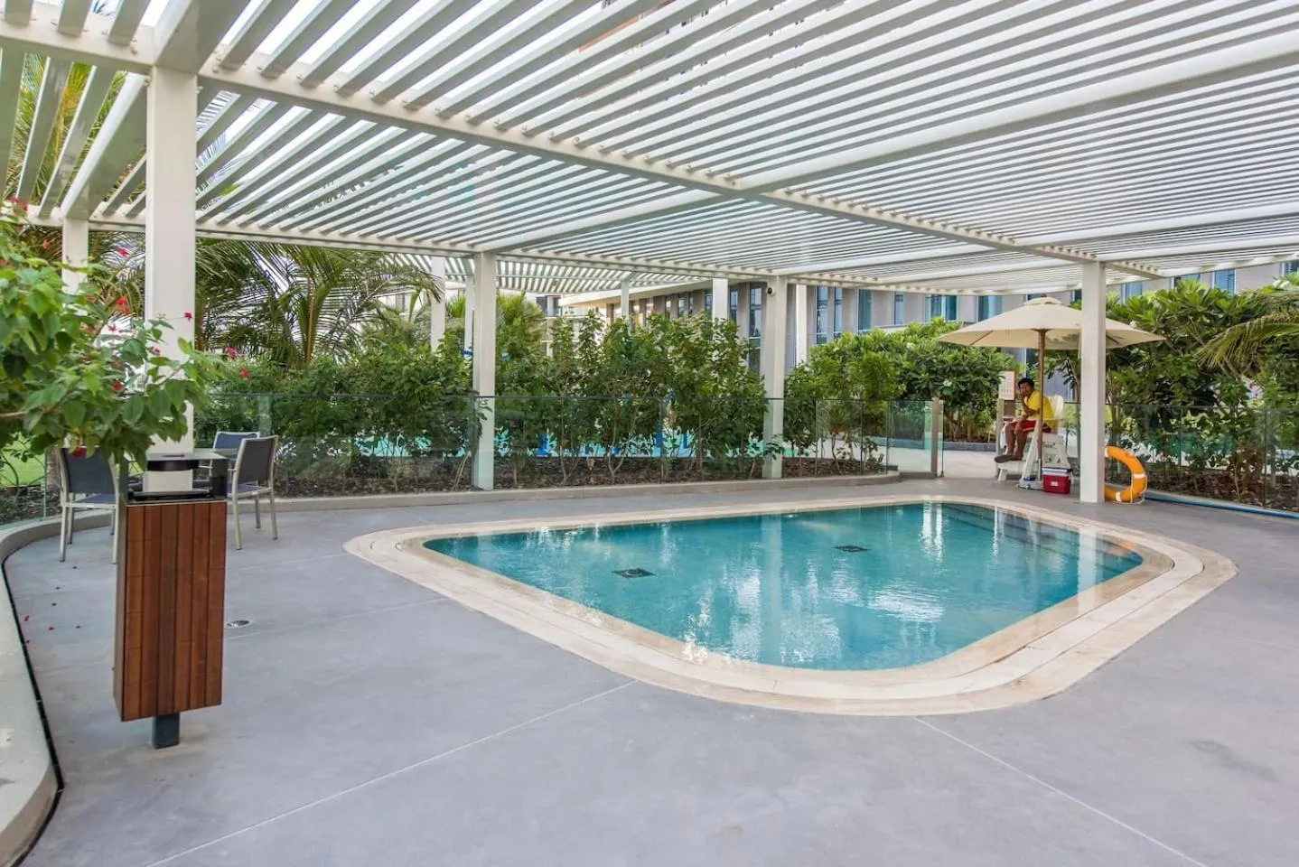 Swimming pool in Posh 2 BR Oceanfront Apt in the Heart of Bluewaters Island