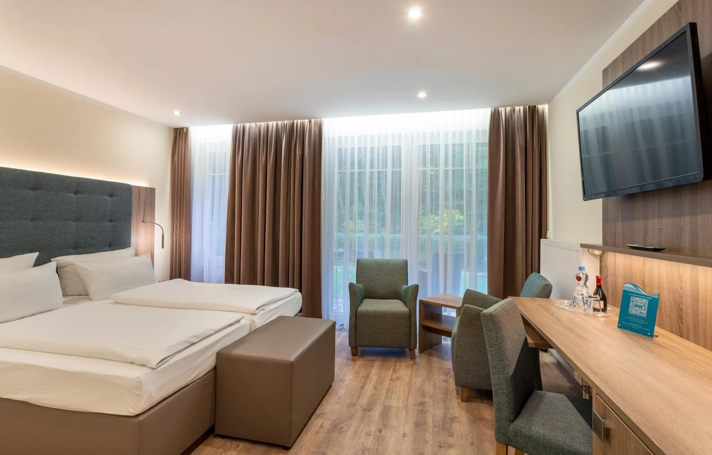 Living room, Bed in Ostseehotel Villen im Park - ein Rovell Hotel