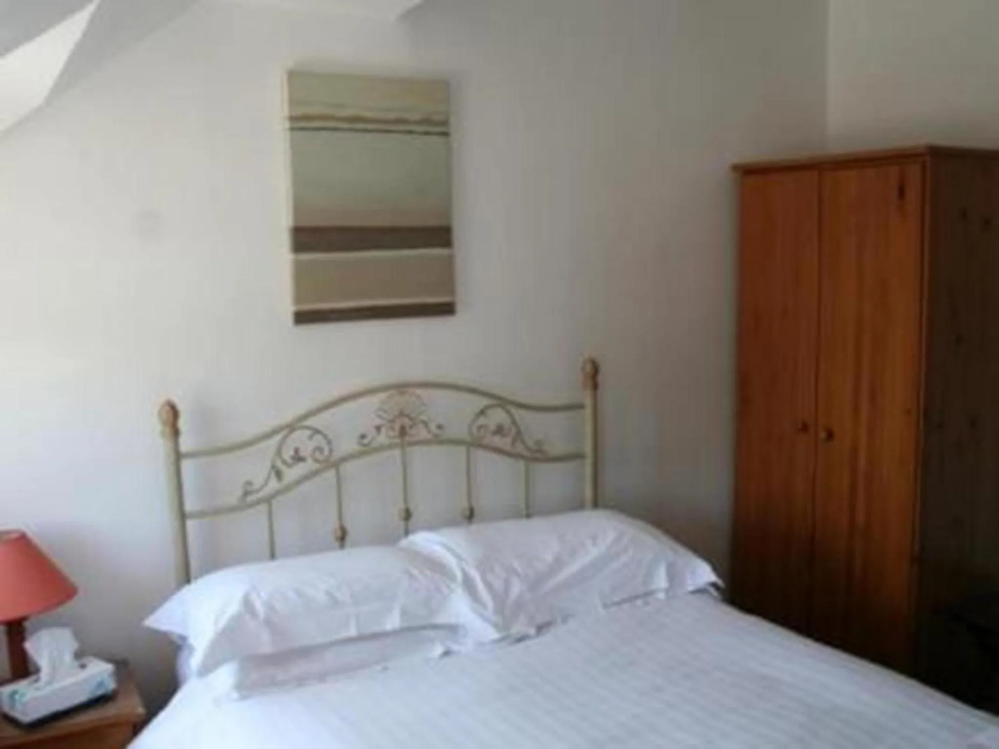 Decorative detail, Bed in Beverley Inn & Hotel