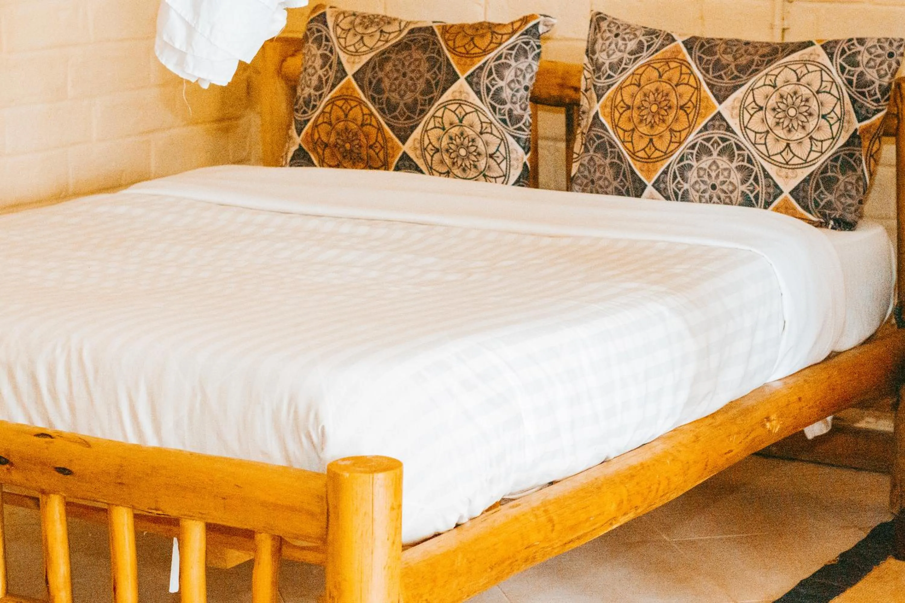 Bed in LUSHOTO EXECUTIVE LODGE