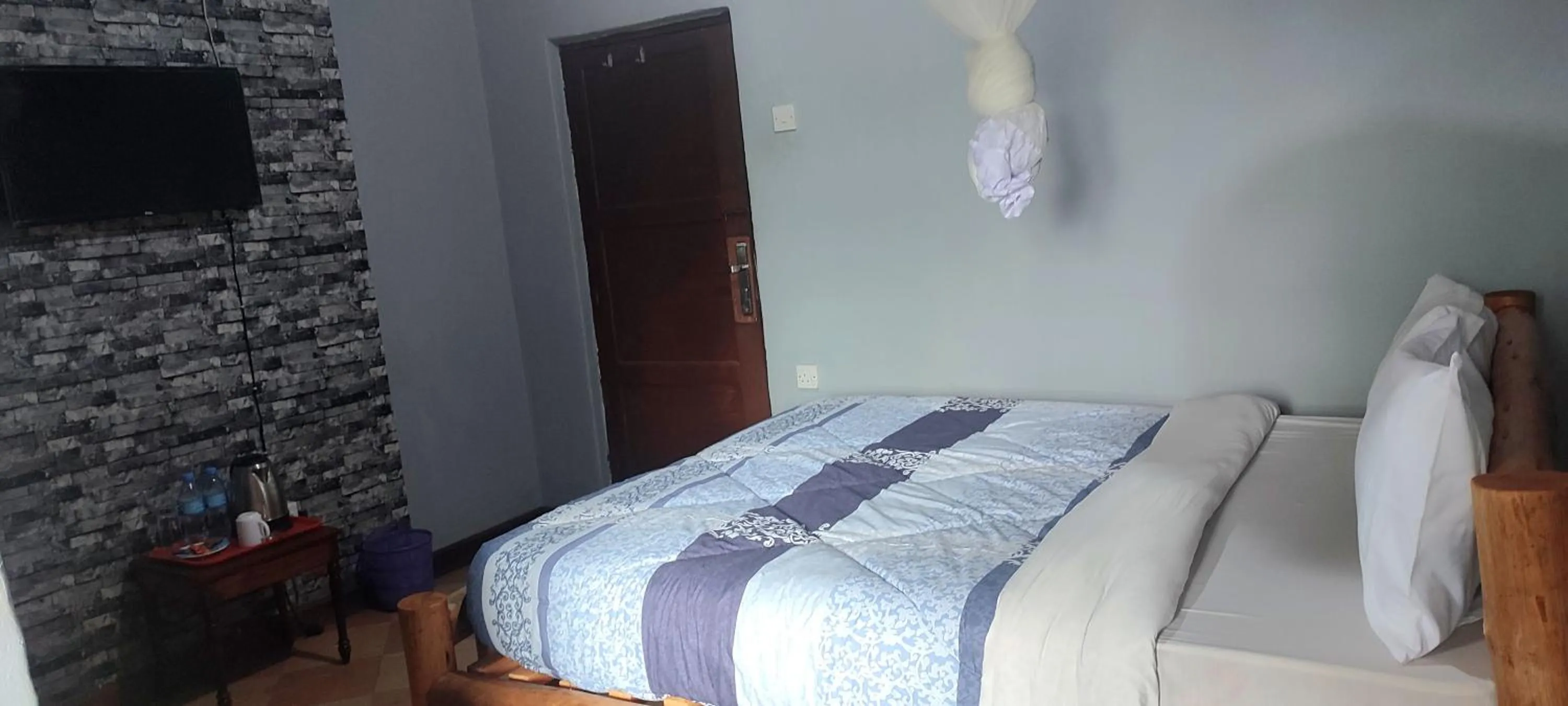 Bed in LUSHOTO EXECUTIVE LODGE