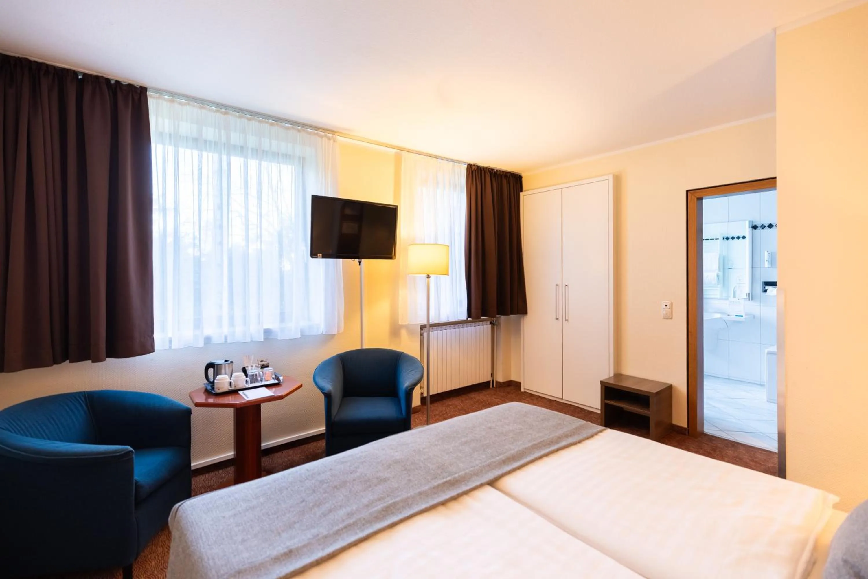 Bed in Select Hotel Silence Garden Köln