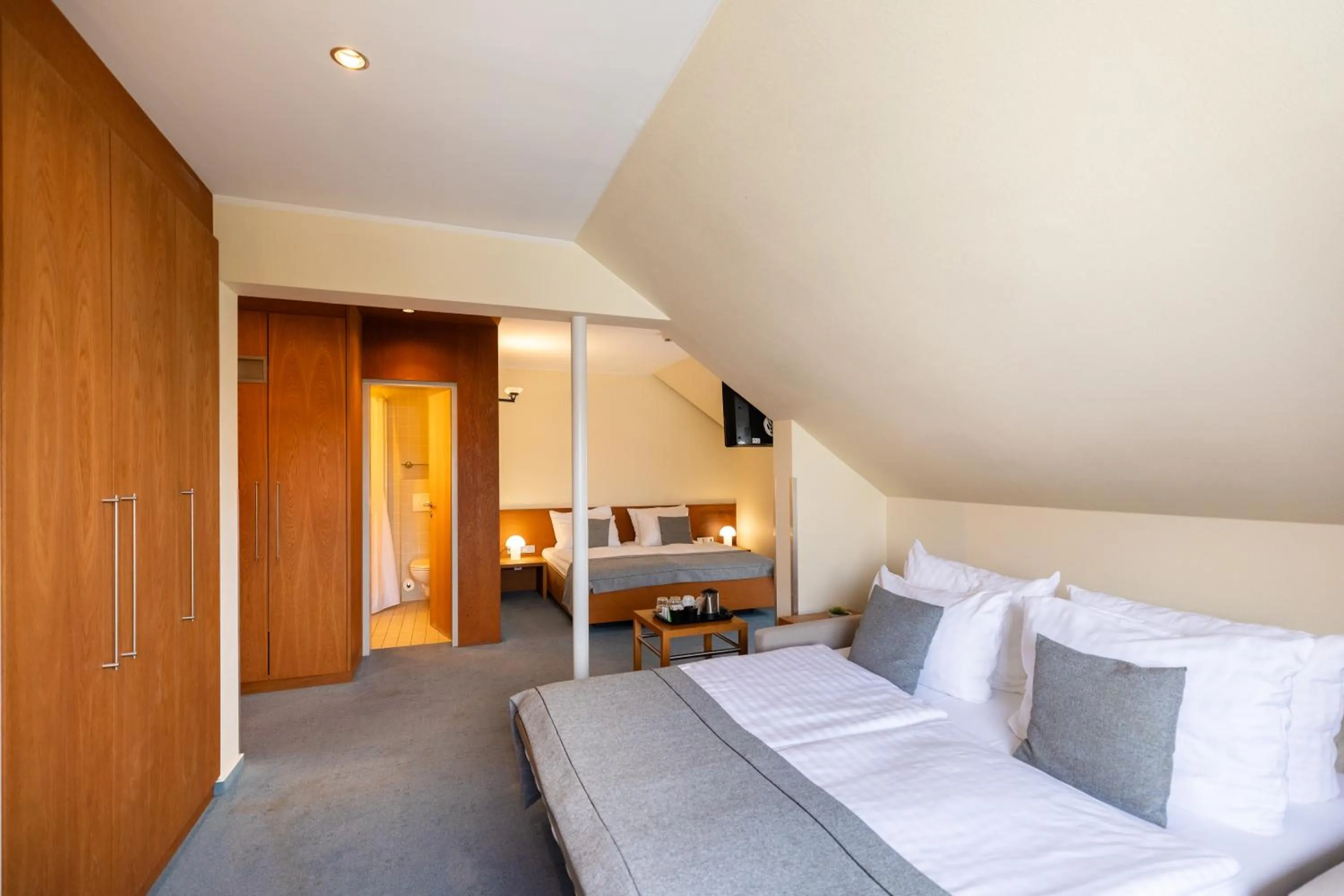 Bed in Select Hotel Silence Garden Köln