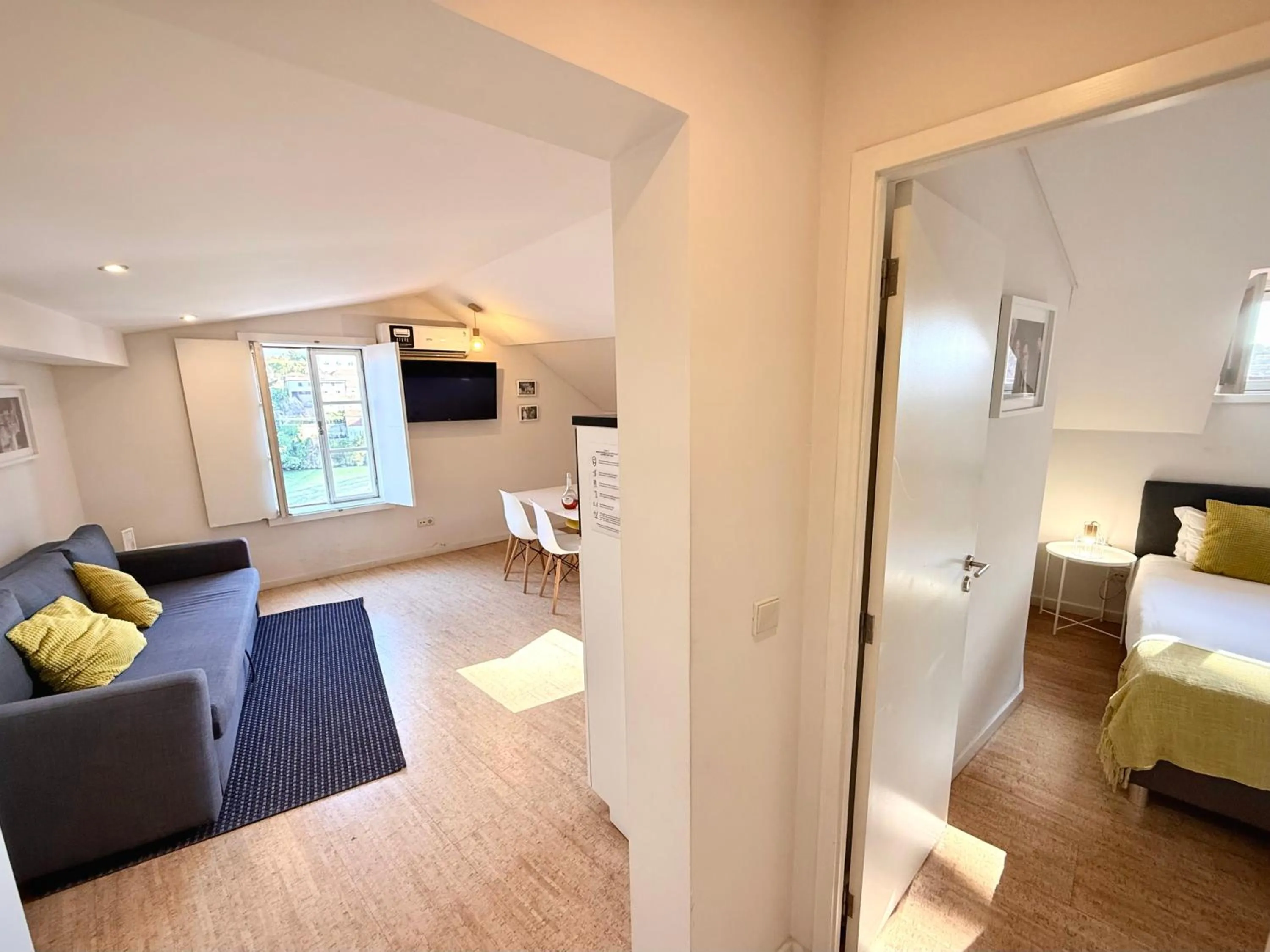 Living room, Bed in Ribeira Cinema Apartments