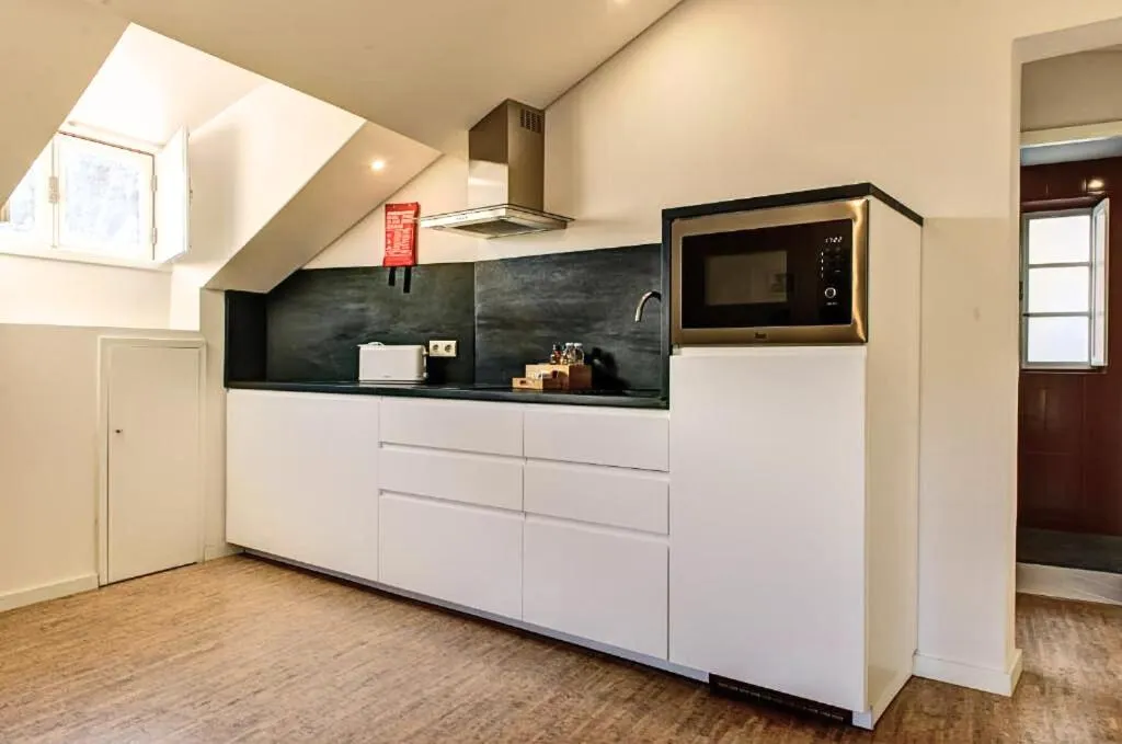 Kitchen or kitchenette in Ribeira Cinema Apartments