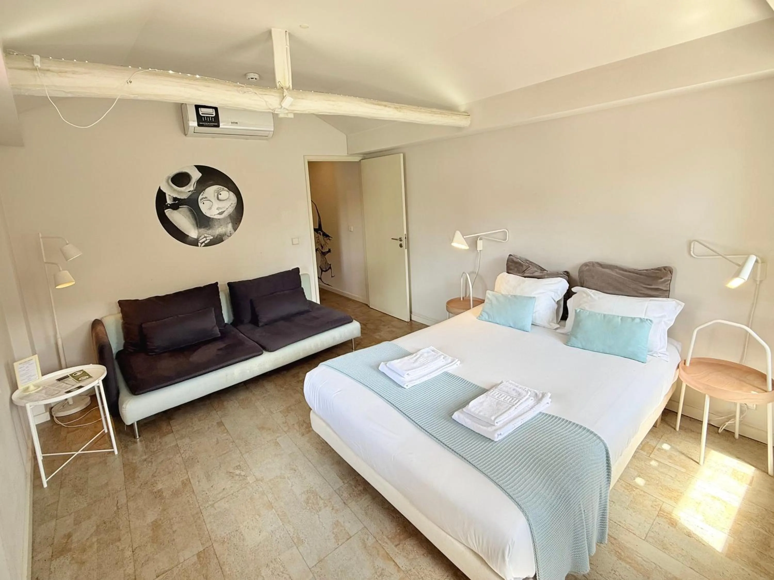 Bed in Ribeira Cinema Apartments