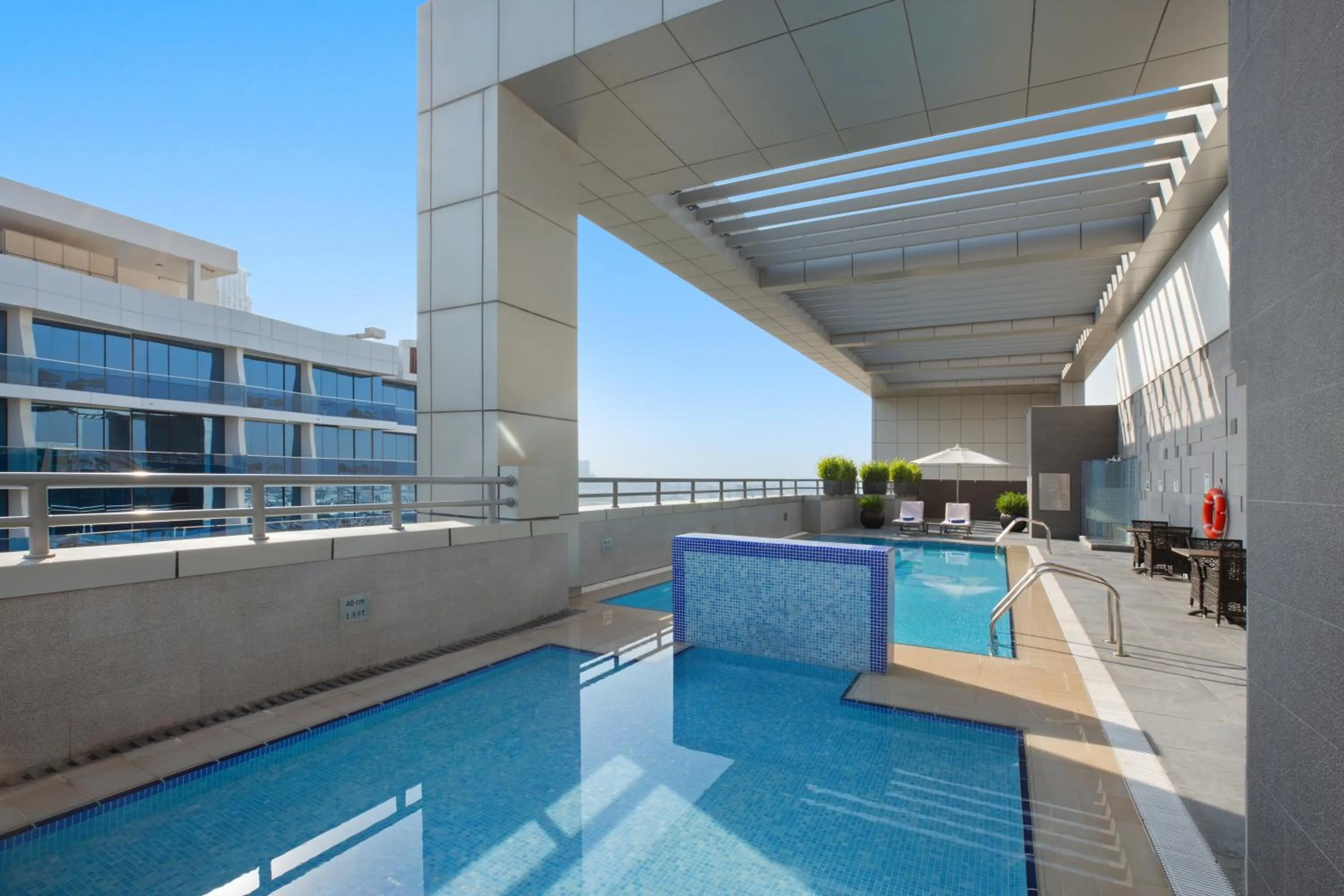 Swimming pool in Royal Continental Suites Business Bay - Deluxe Apartments