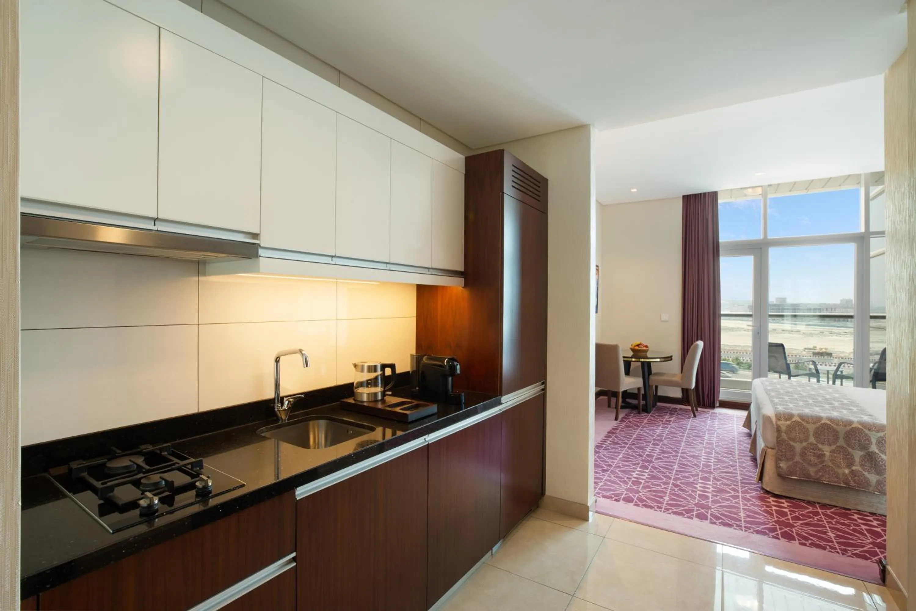 Kitchen or kitchenette in Royal Continental Suites Business Bay - Deluxe Apartments