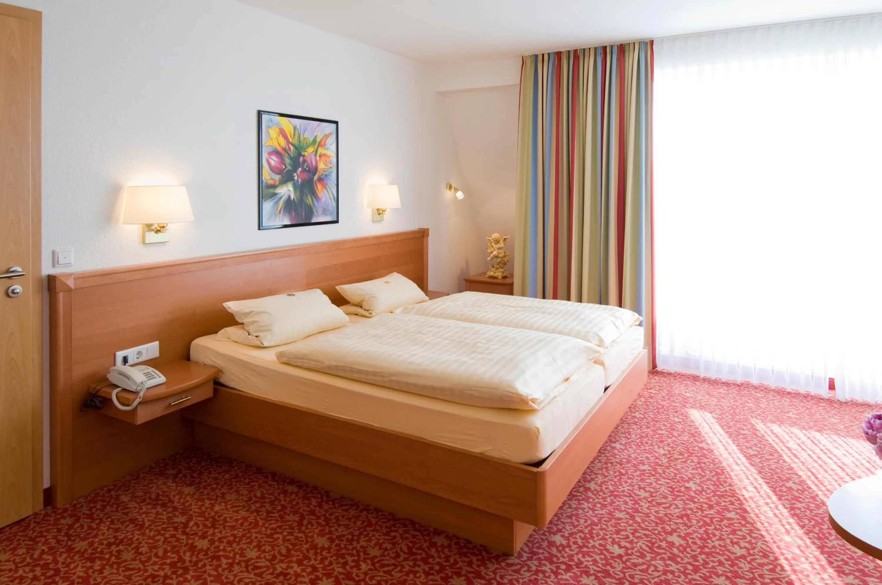 Bed in Hotel Petersen