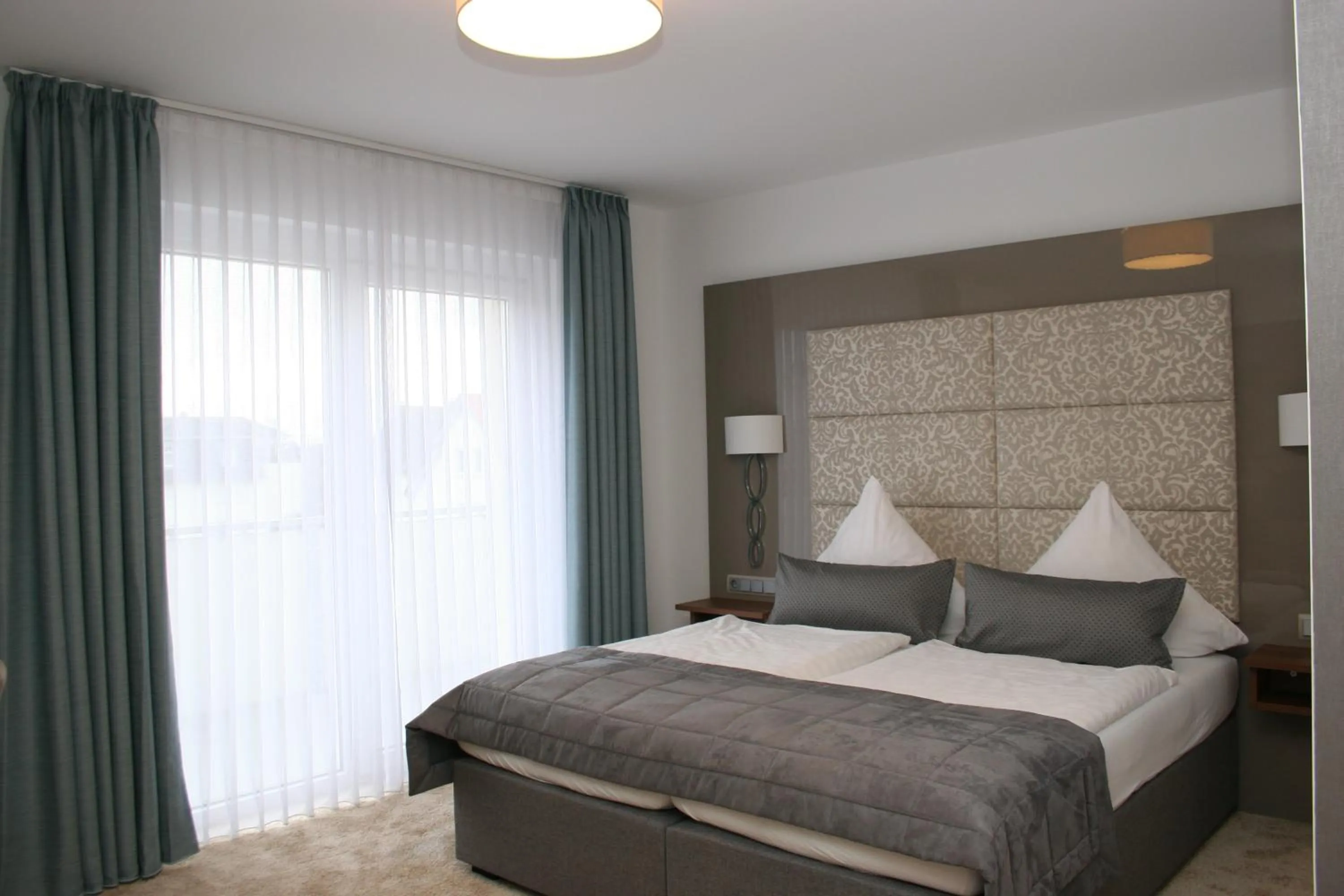 Bed in Hotel Petersen