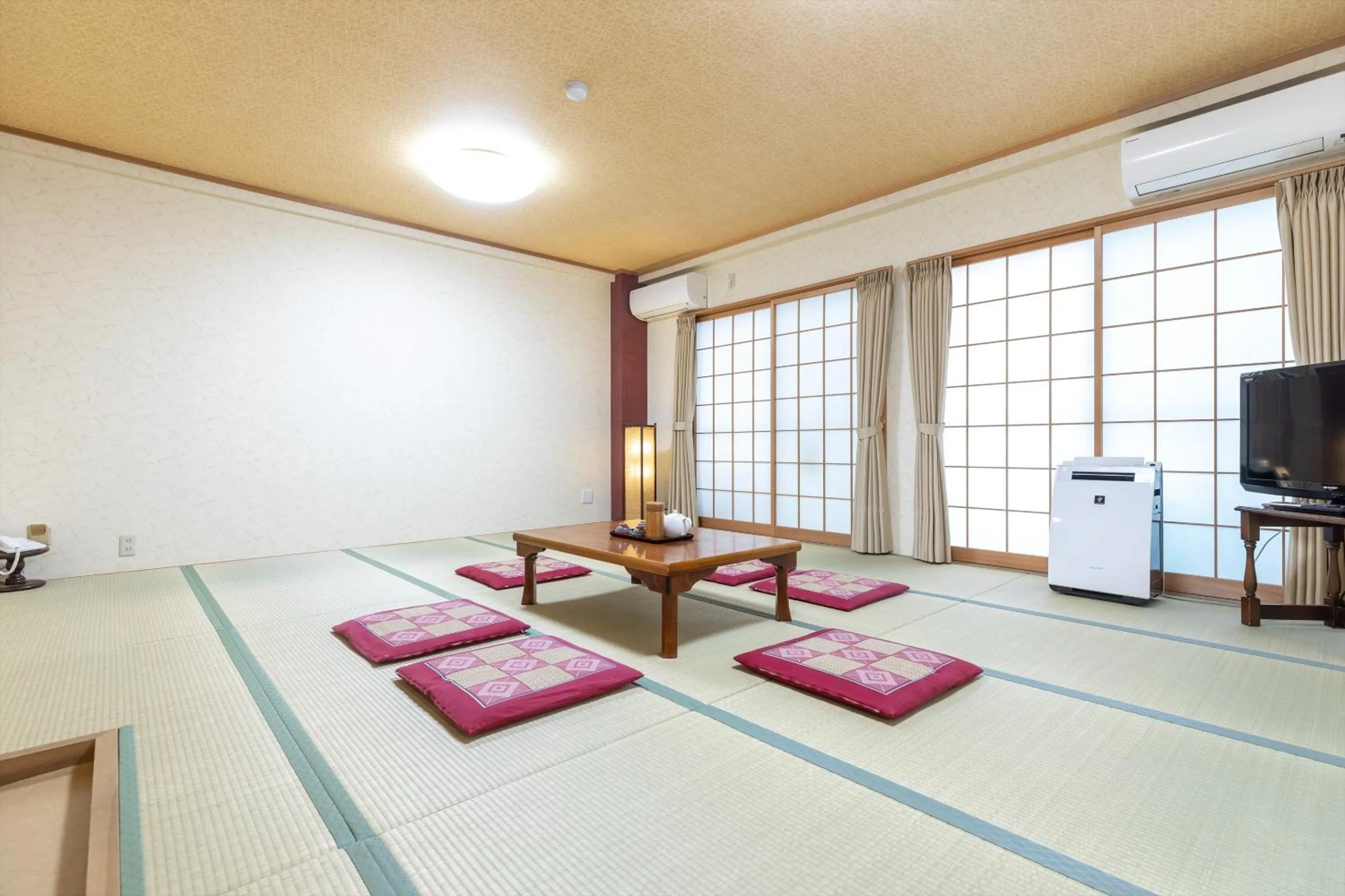Seating area, Bed in Business Ryokan Akashiya Annex