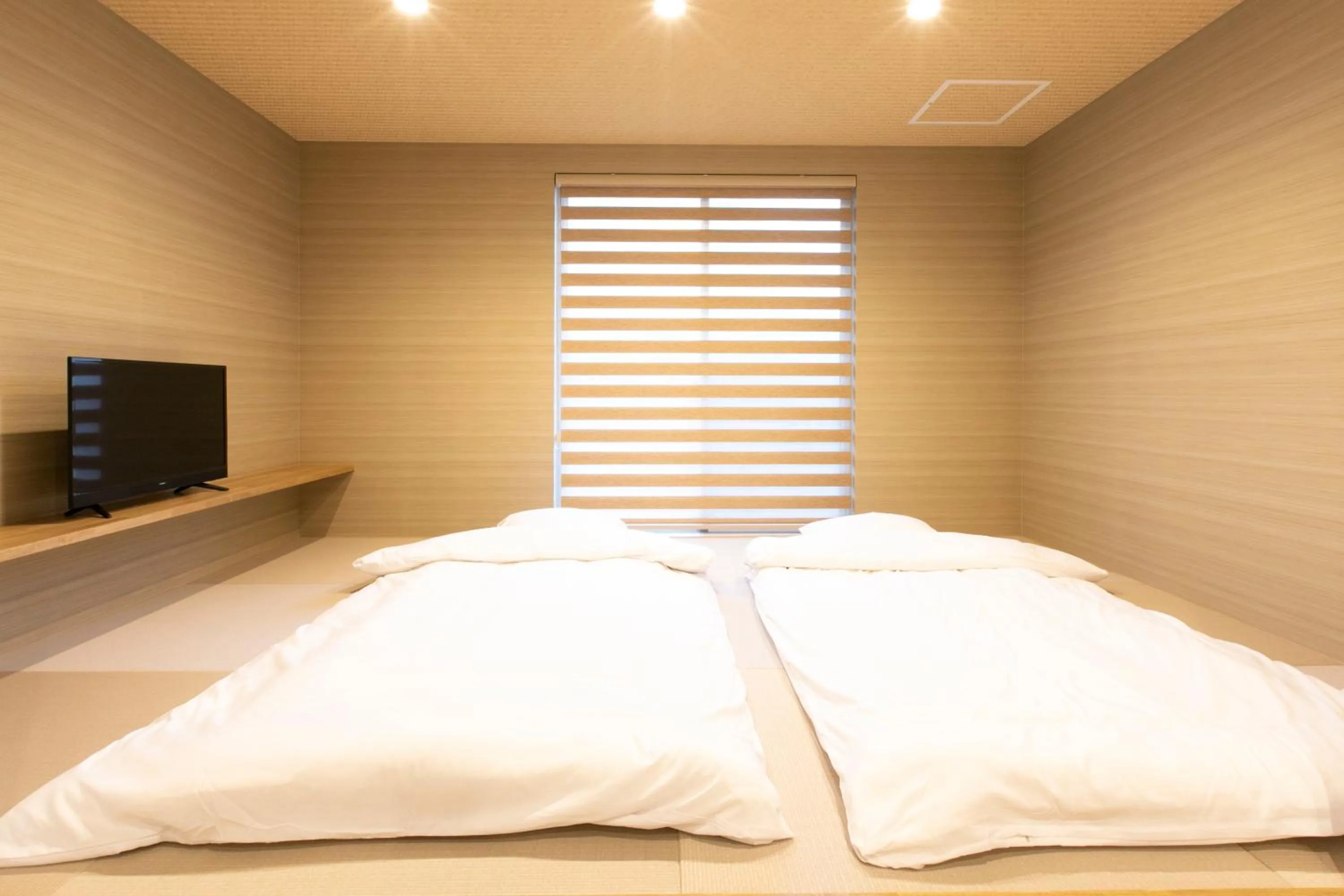 Bed in Apartment Hotel STAY THE Kansai Airport
