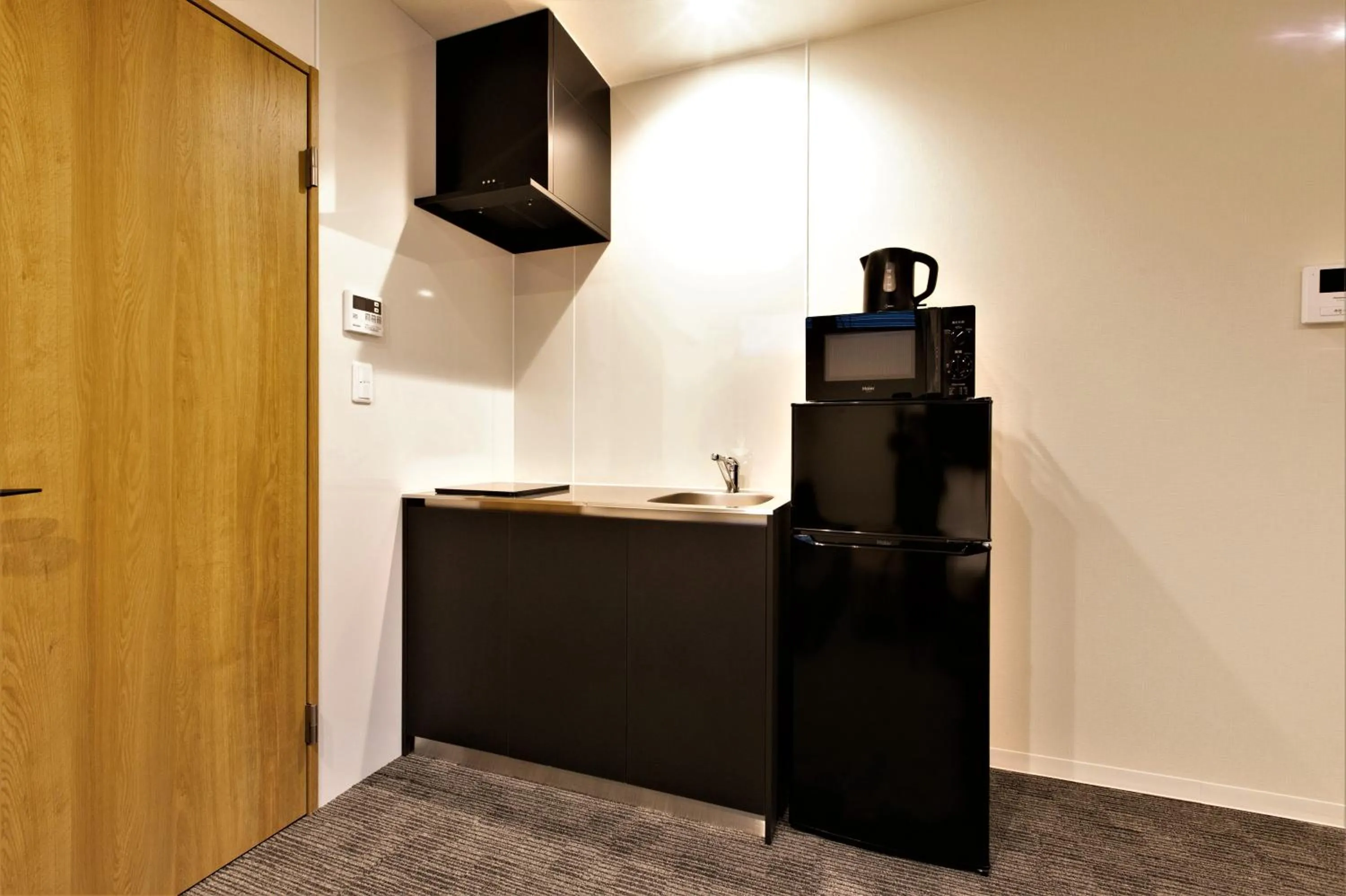 Kitchen or kitchenette in Apartment Hotel STAY THE Kansai Airport