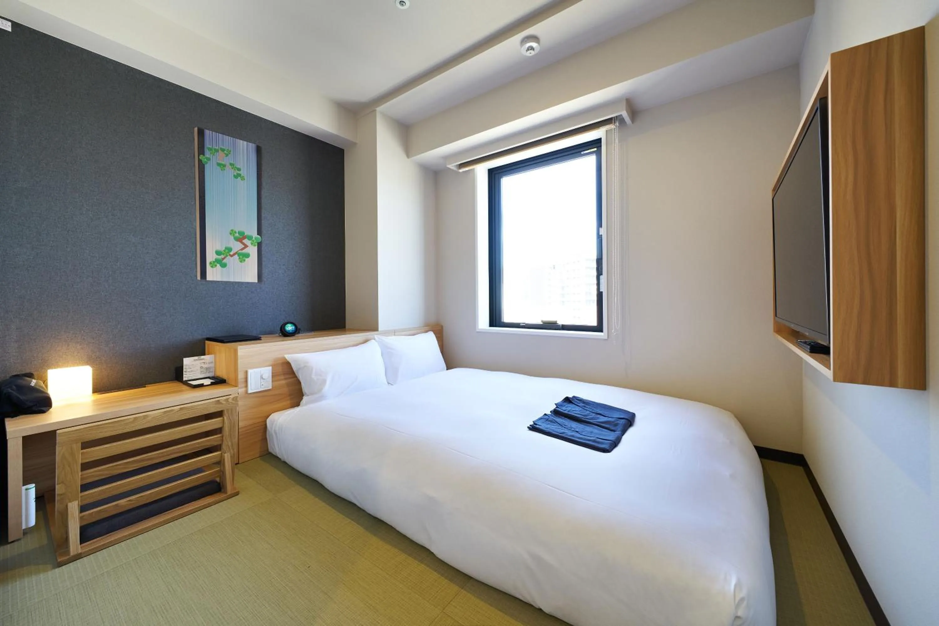 Bed in HOTEL Enmichi