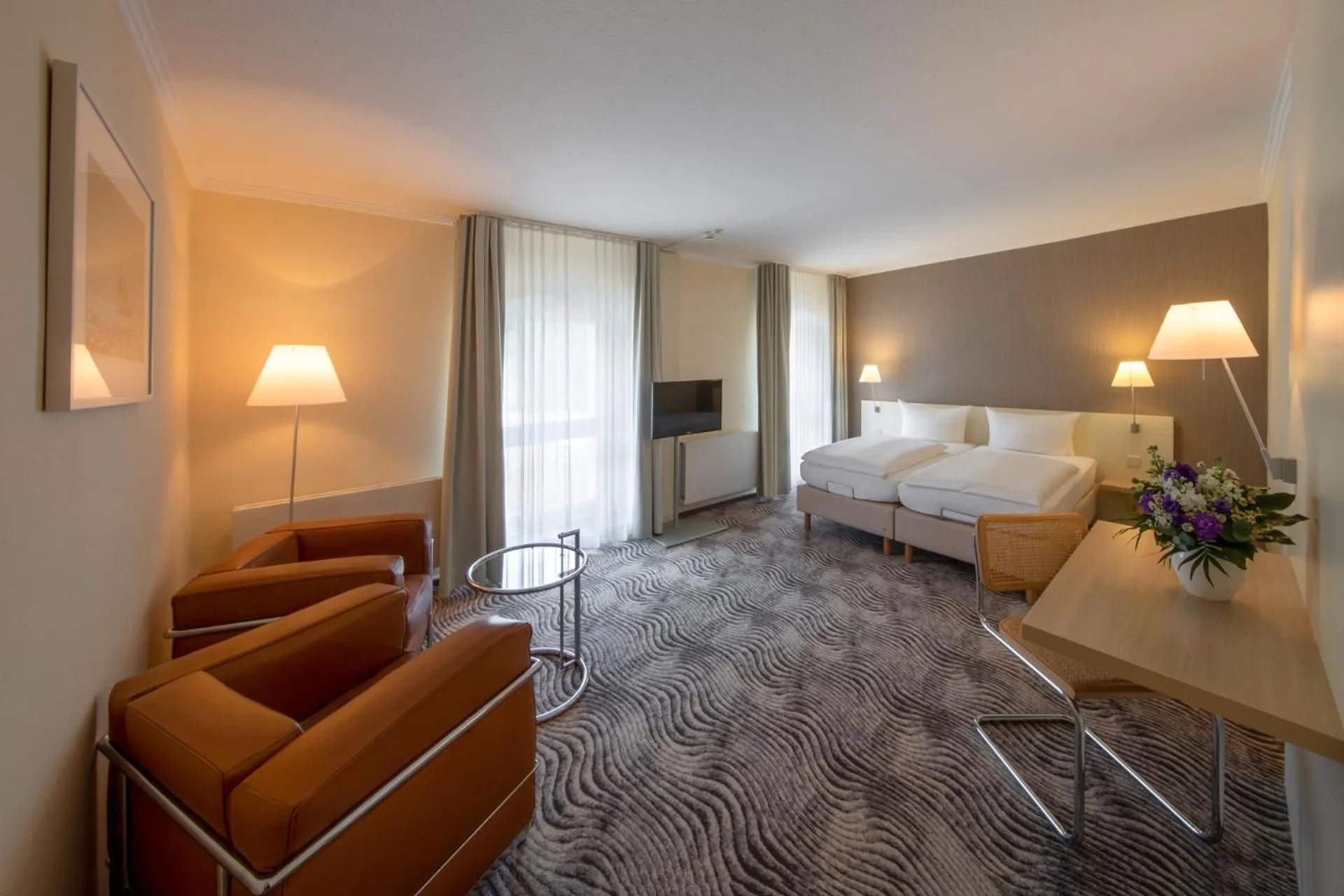 Photo of the whole room, Bed in Michels Thalasso Hotel Nordseehaus