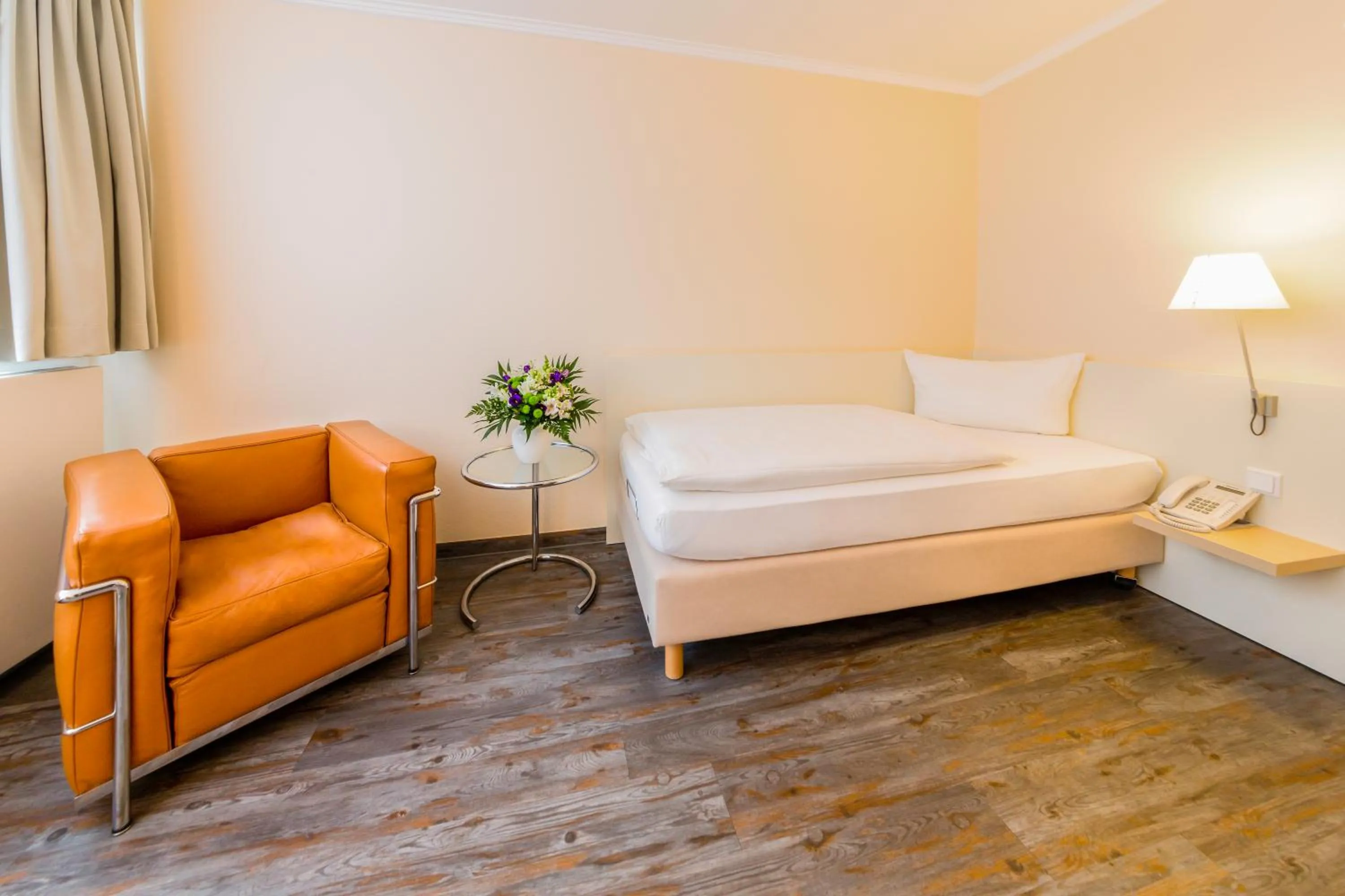 Photo of the whole room, Bed in Michels Thalasso Hotel Nordseehaus