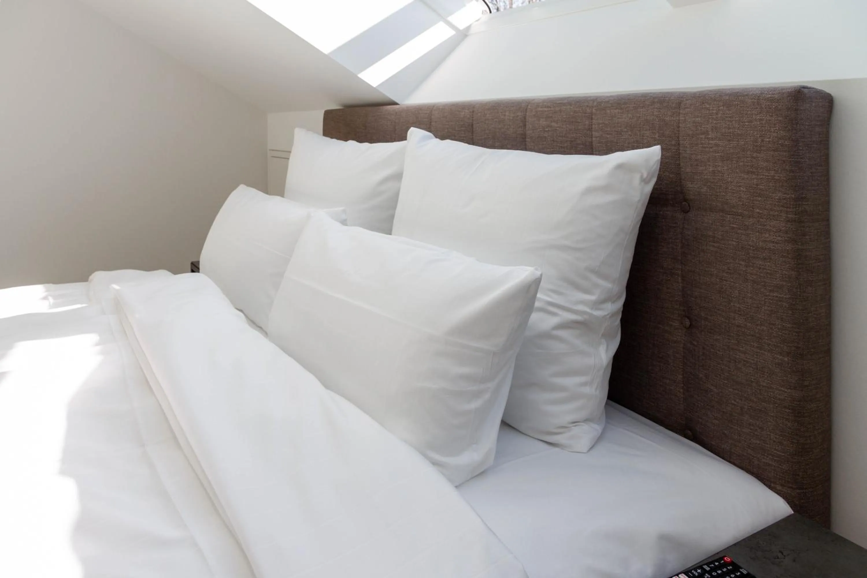 Bed in Toploft Serviced Apartments