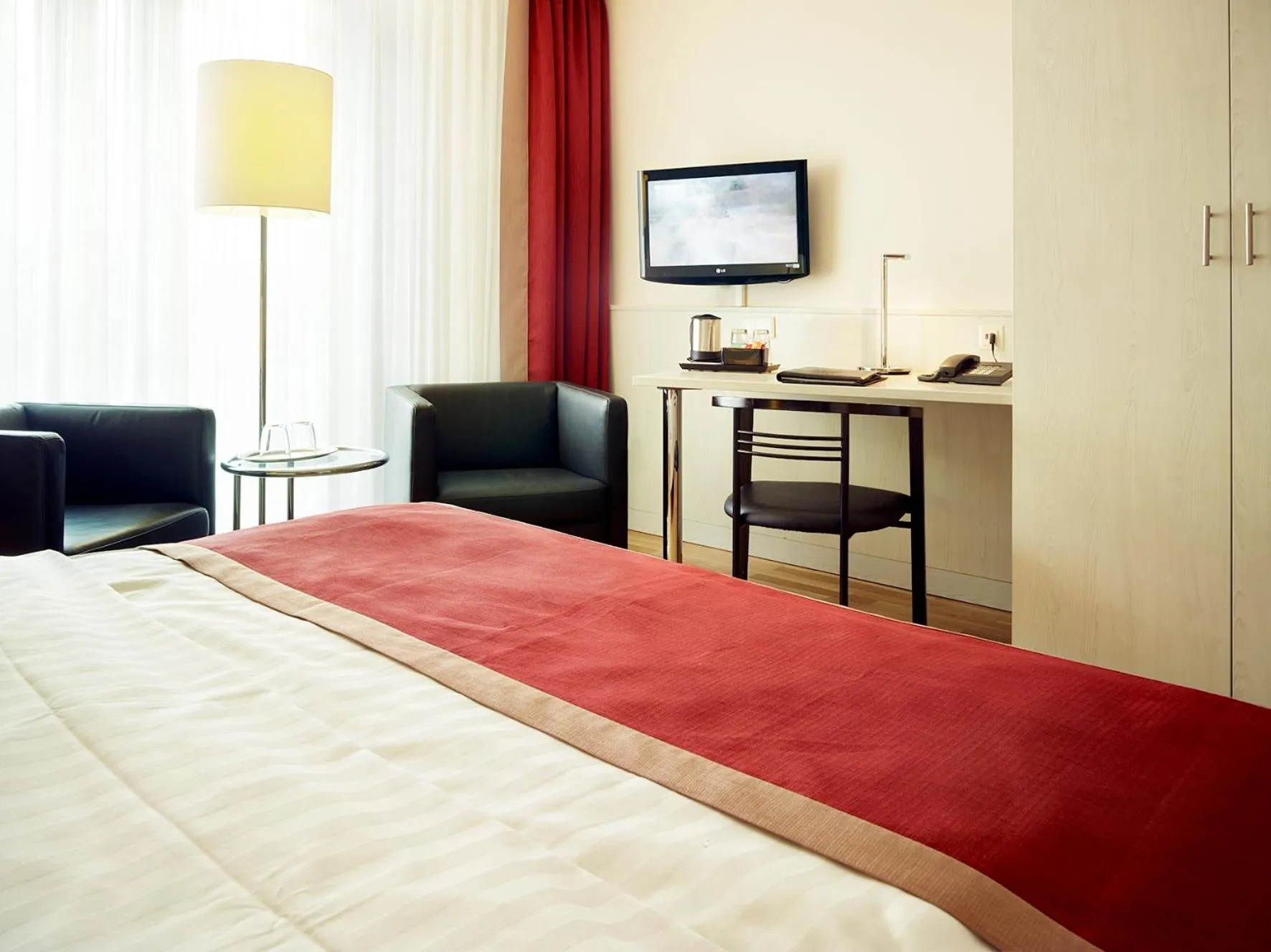 Photo of the whole room, Bed in Hotel Stadt Freiburg