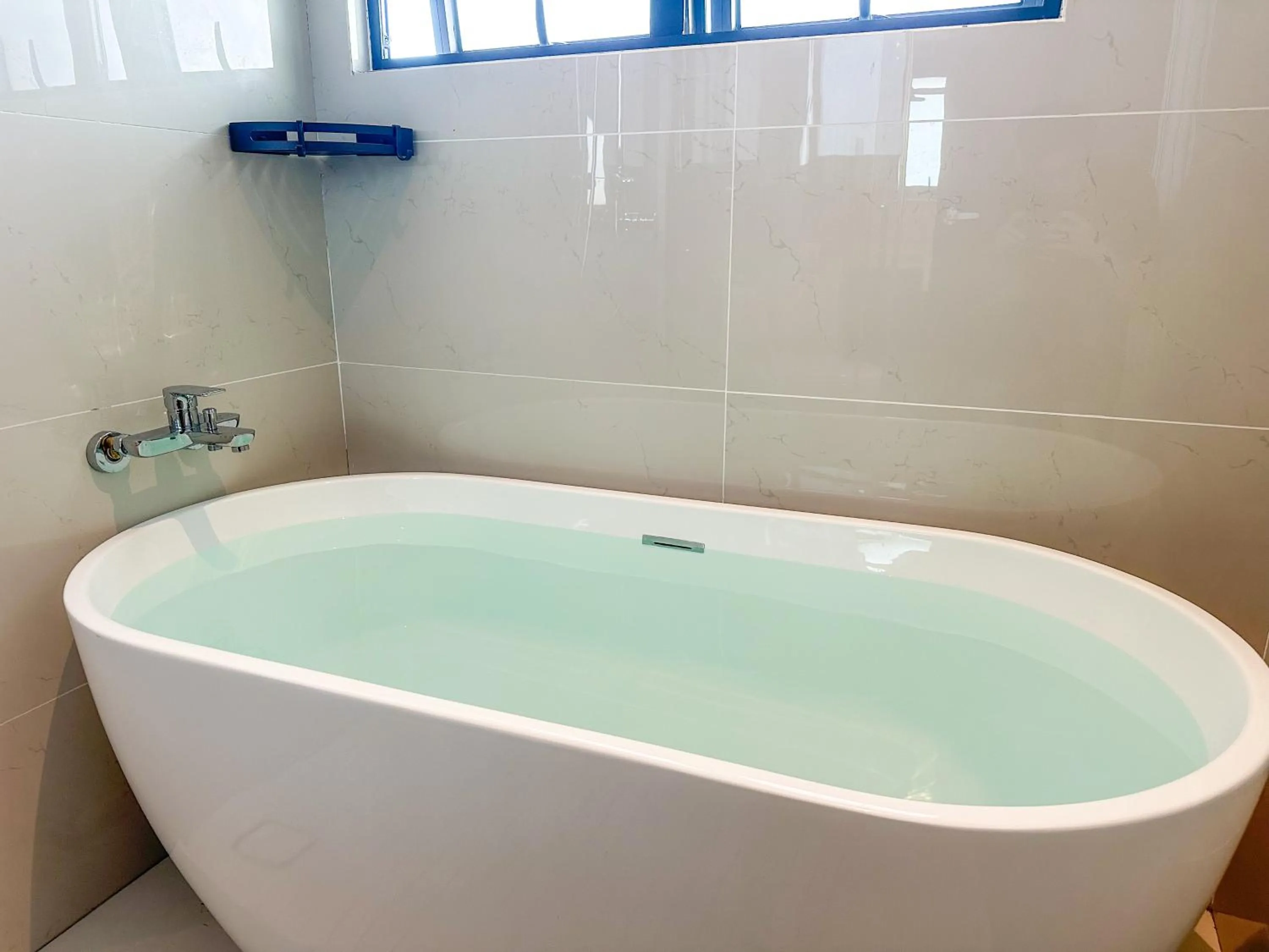 Bath in Country Garden Seaview Suite by Nest Home at Danga Bay