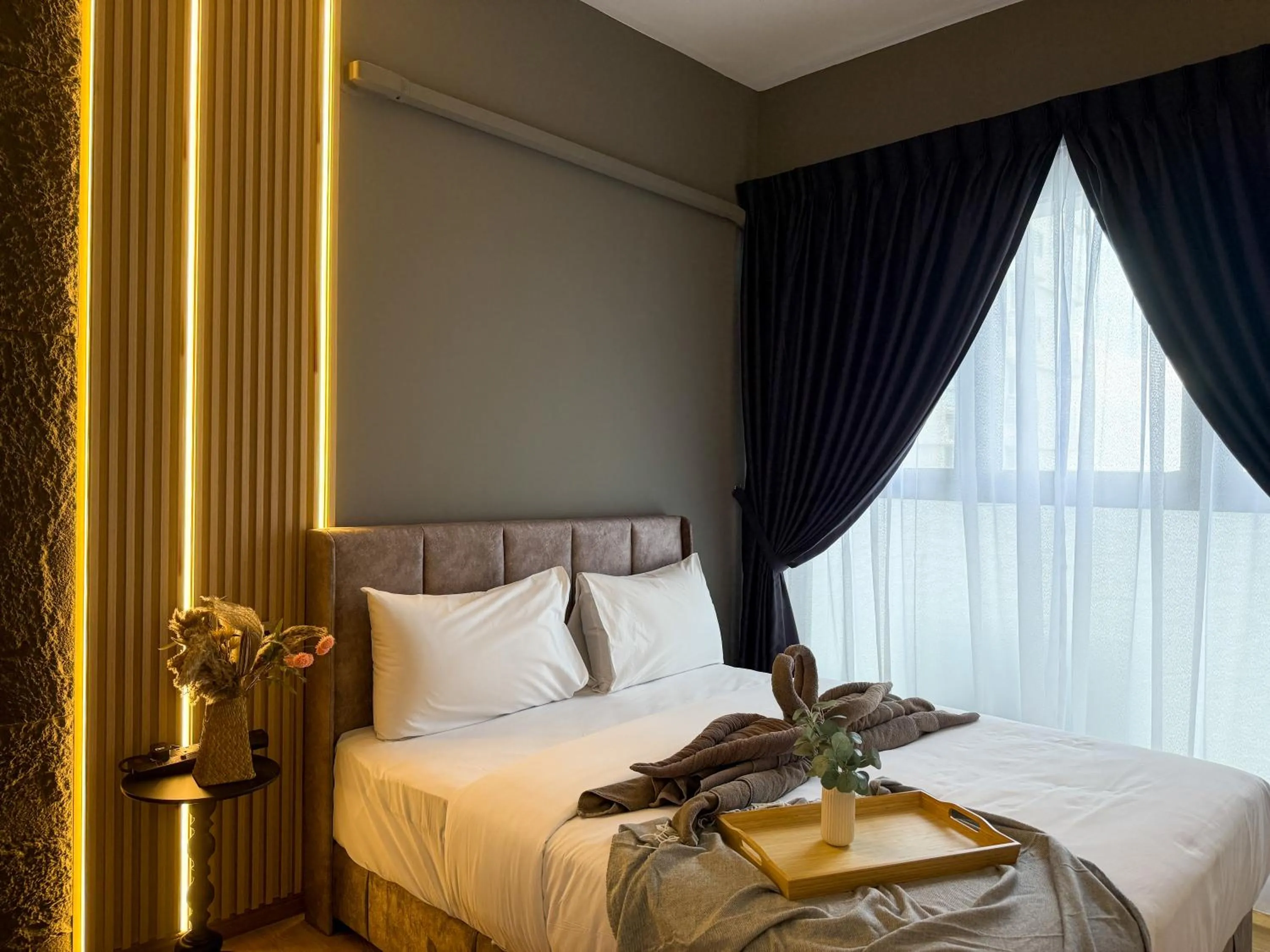 Bed in Country Garden Seaview Suite by Nest Home at Danga Bay