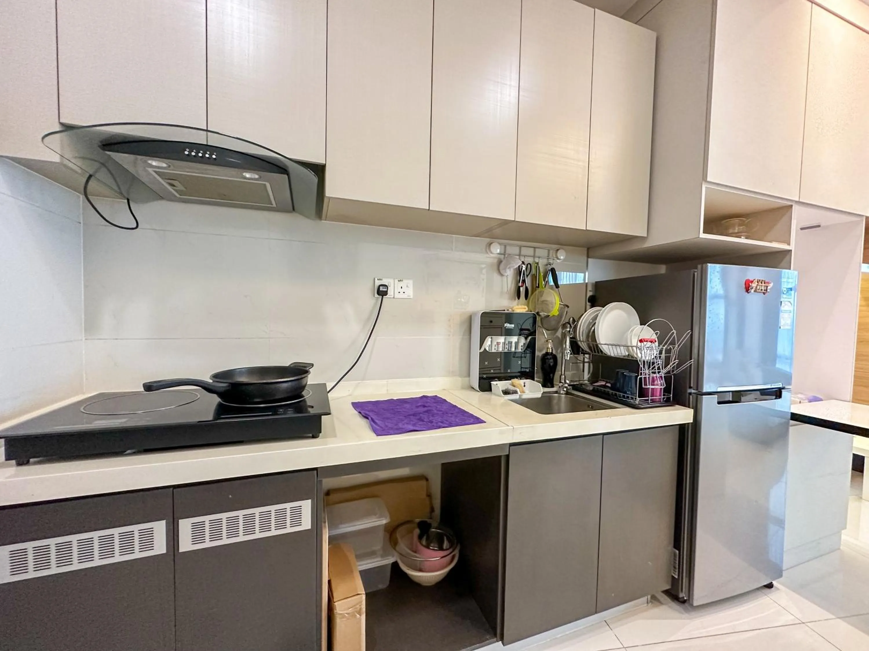 kitchen in Country Garden Seaview Suite by Nest Home at Danga Bay