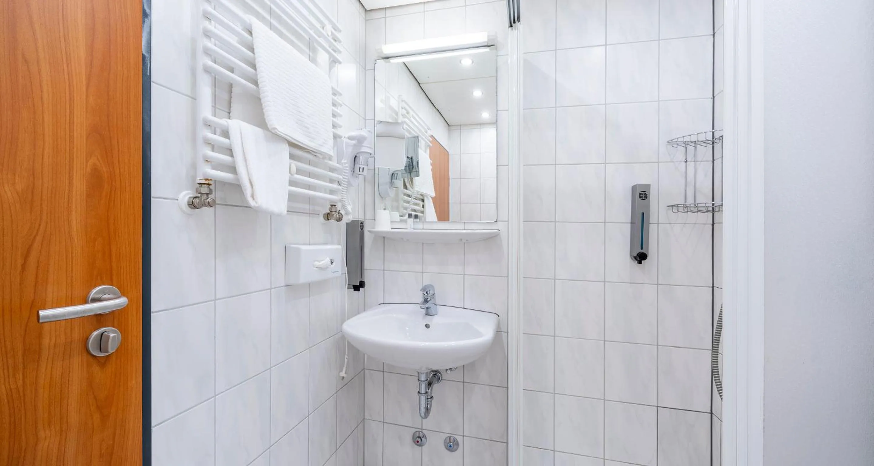 Bathroom in PLAZA Hotel Föhr am Bodensee