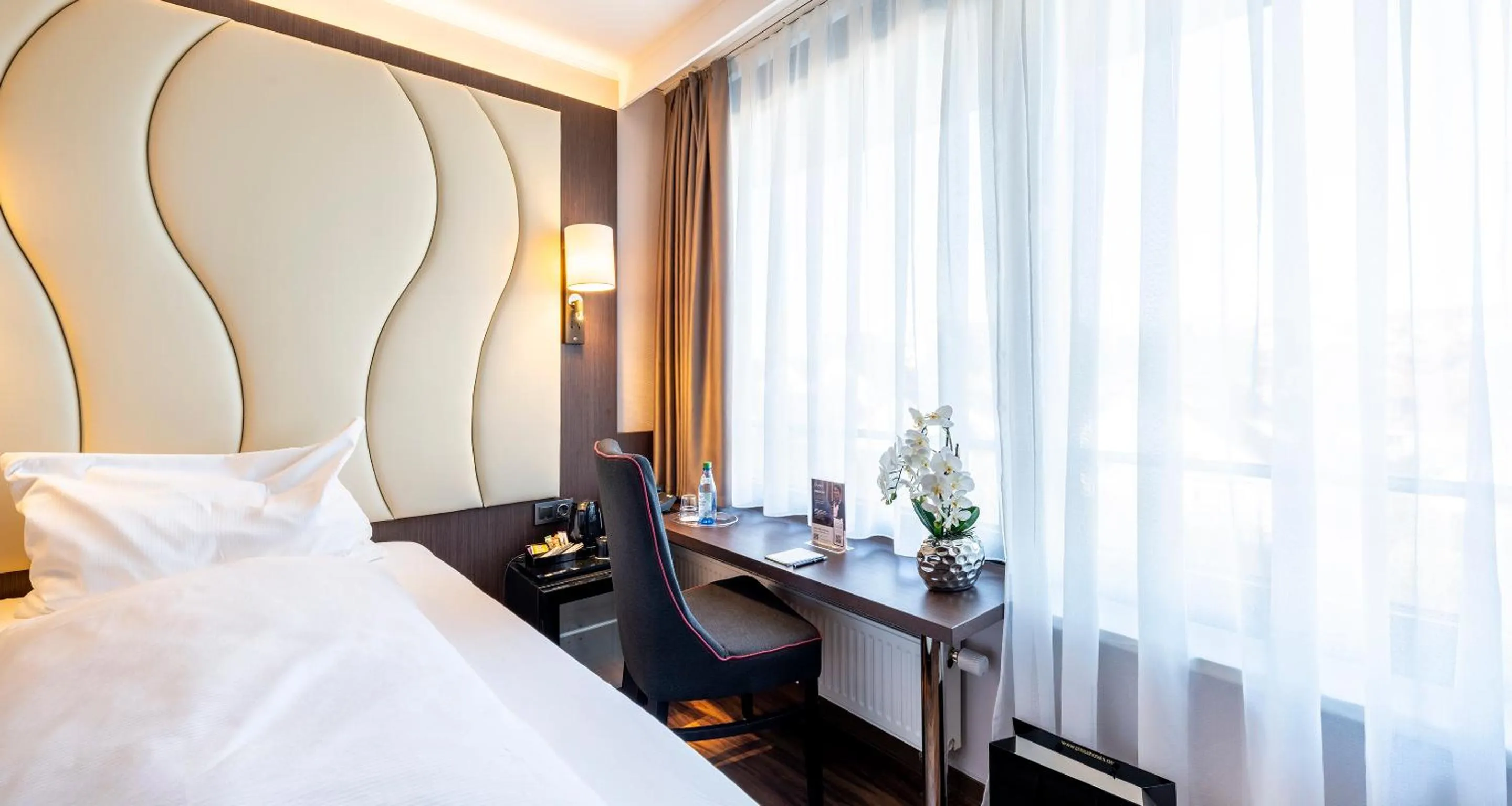 Bed in PLAZA Hotel Föhr am Bodensee