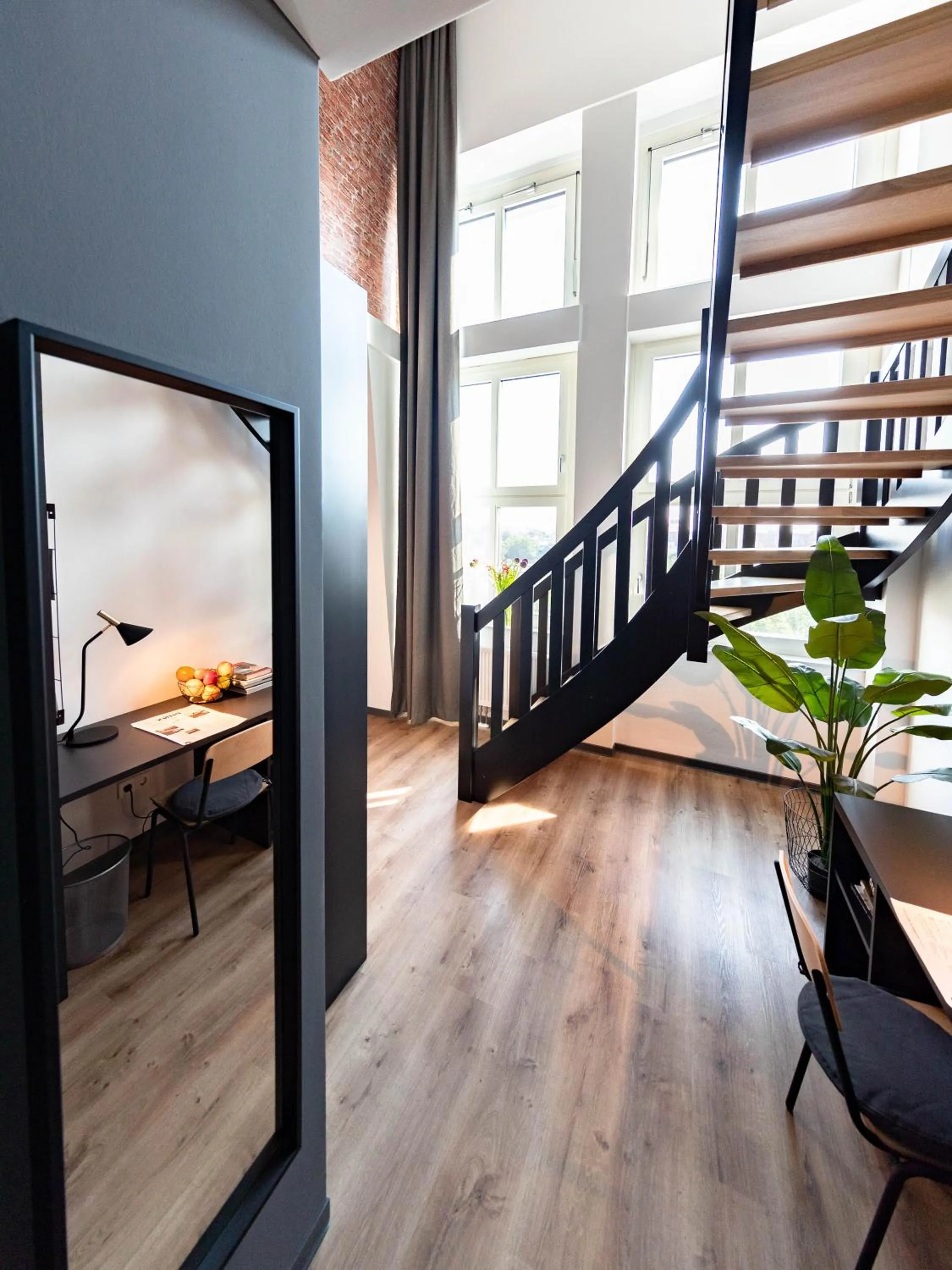 Living room in PHNX Aparthotel Hamburg