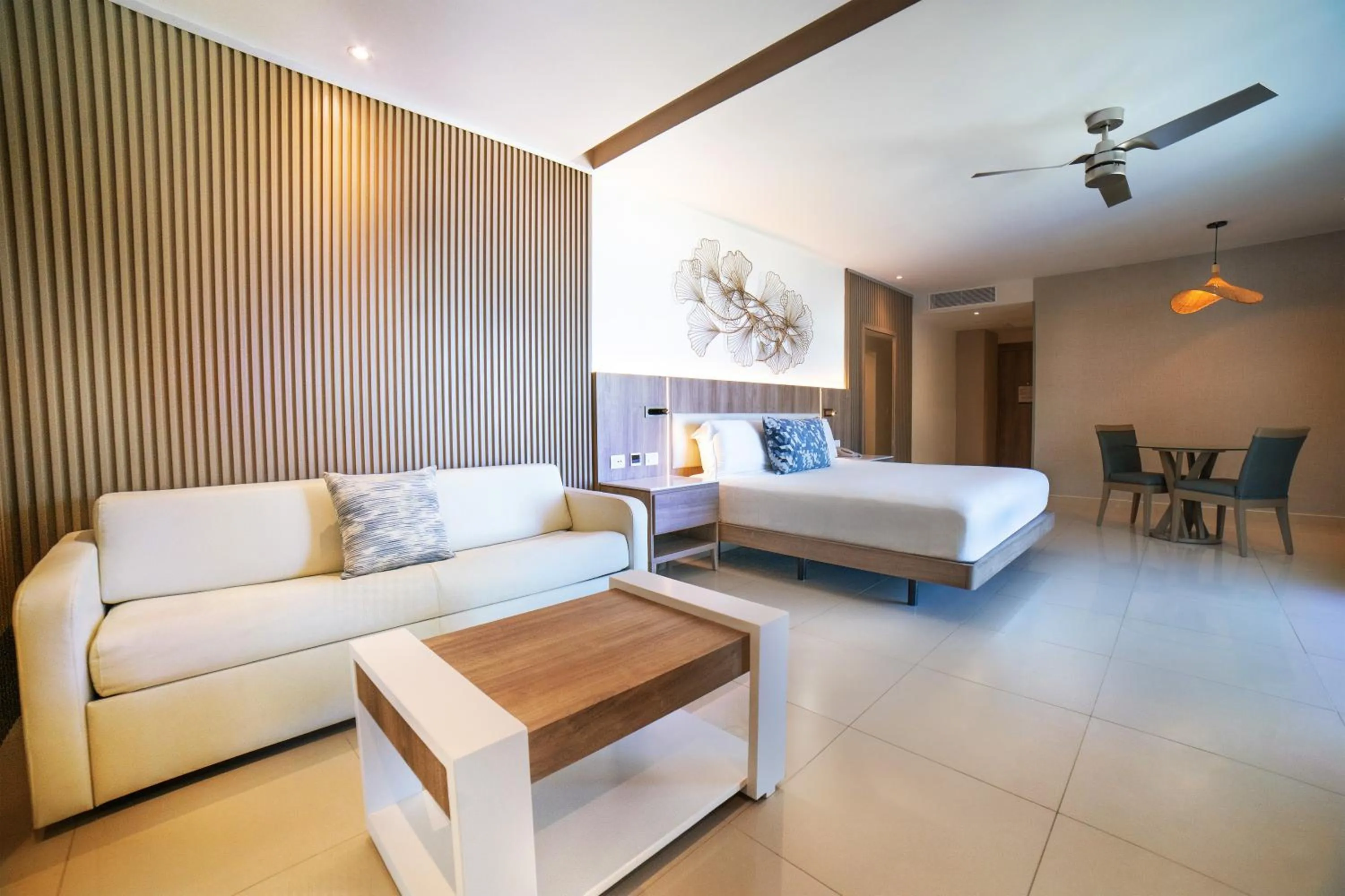 Living room, Bed in Royalton Punta Cana, An Autograph Collection All-Inclusive Resort & Casino