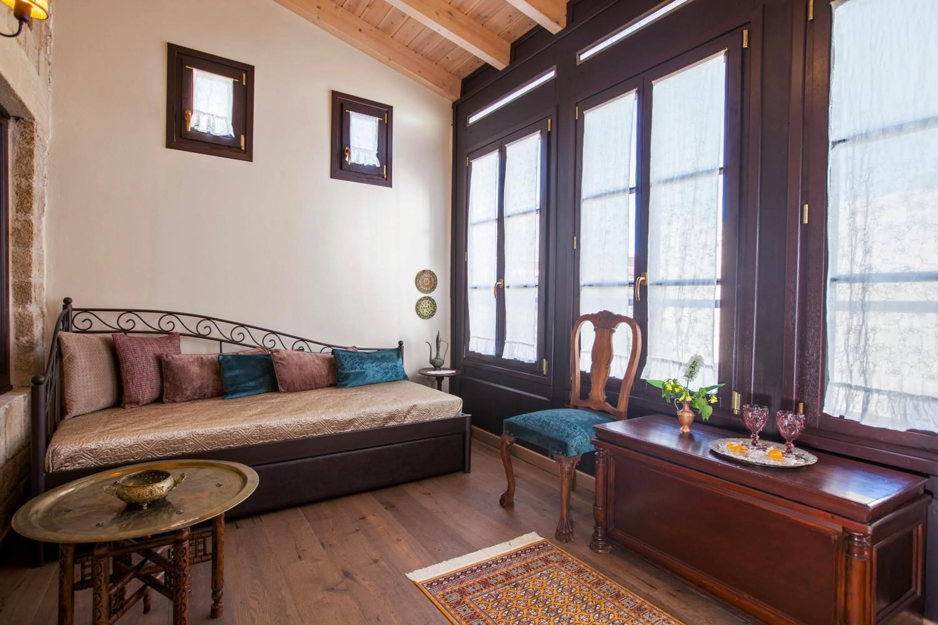 Living room, Bed in Porolithos Boutique Hotel