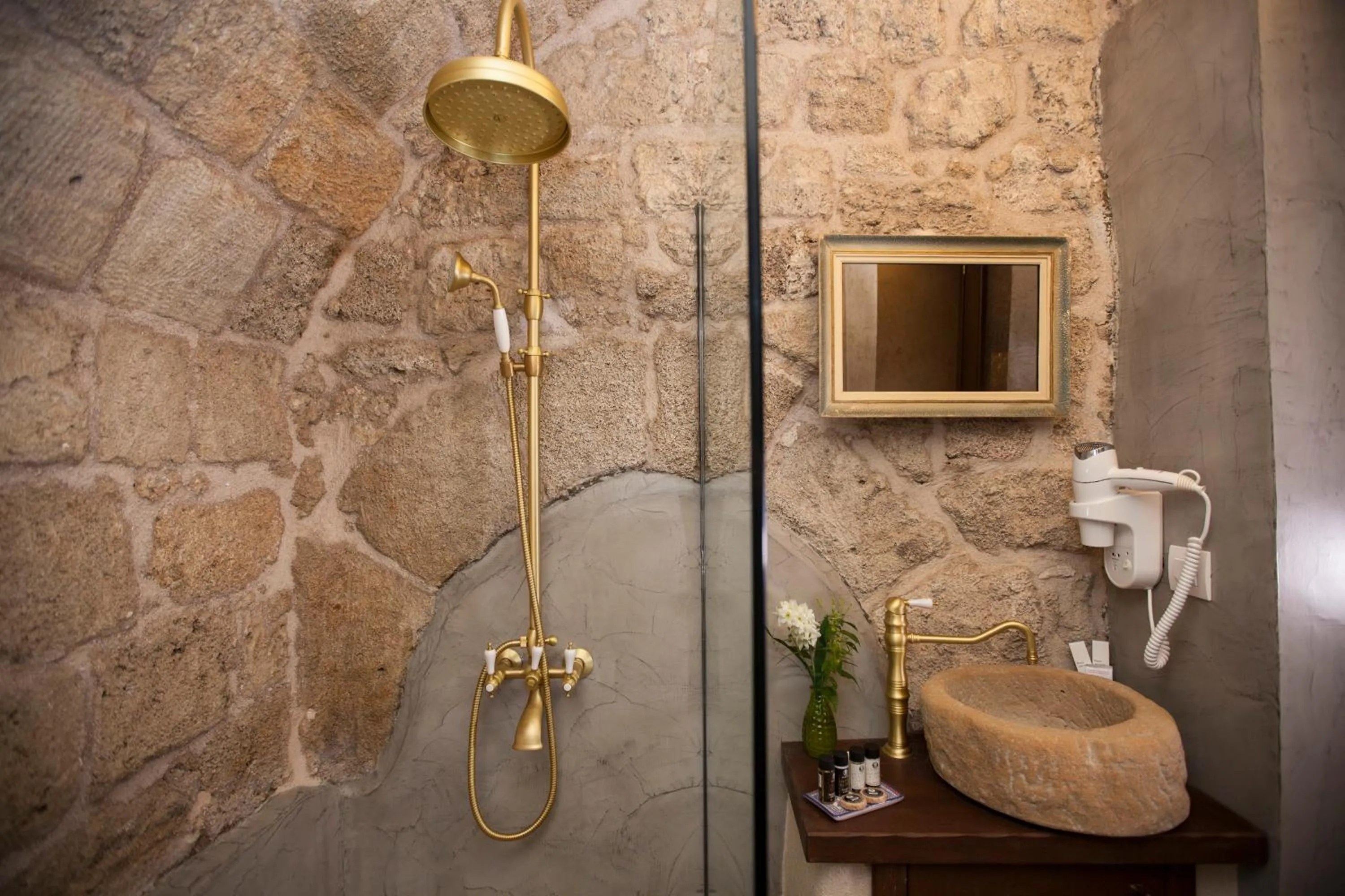 Bathroom in Porolithos Boutique Hotel