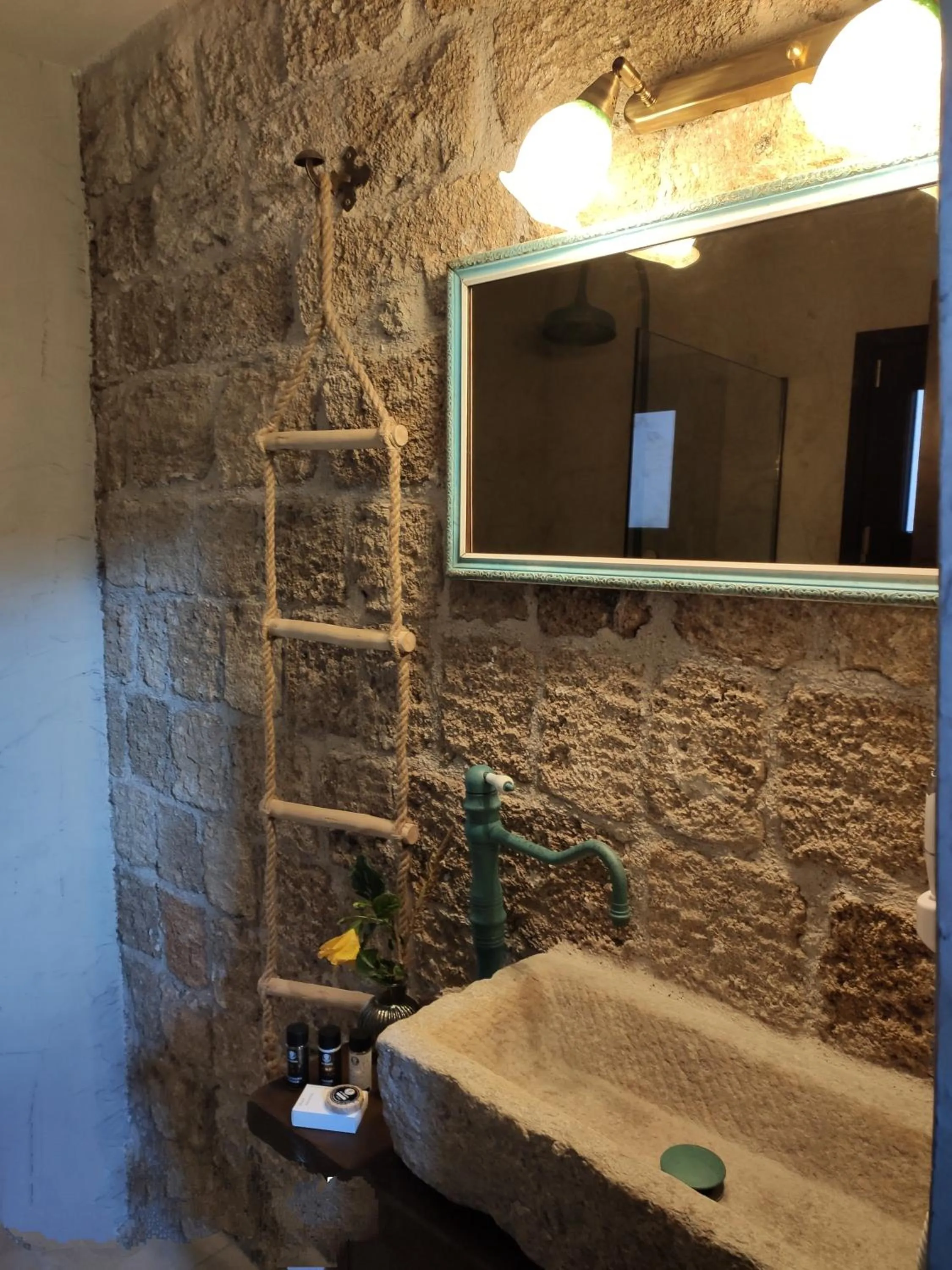 Bathroom in Porolithos Boutique Hotel