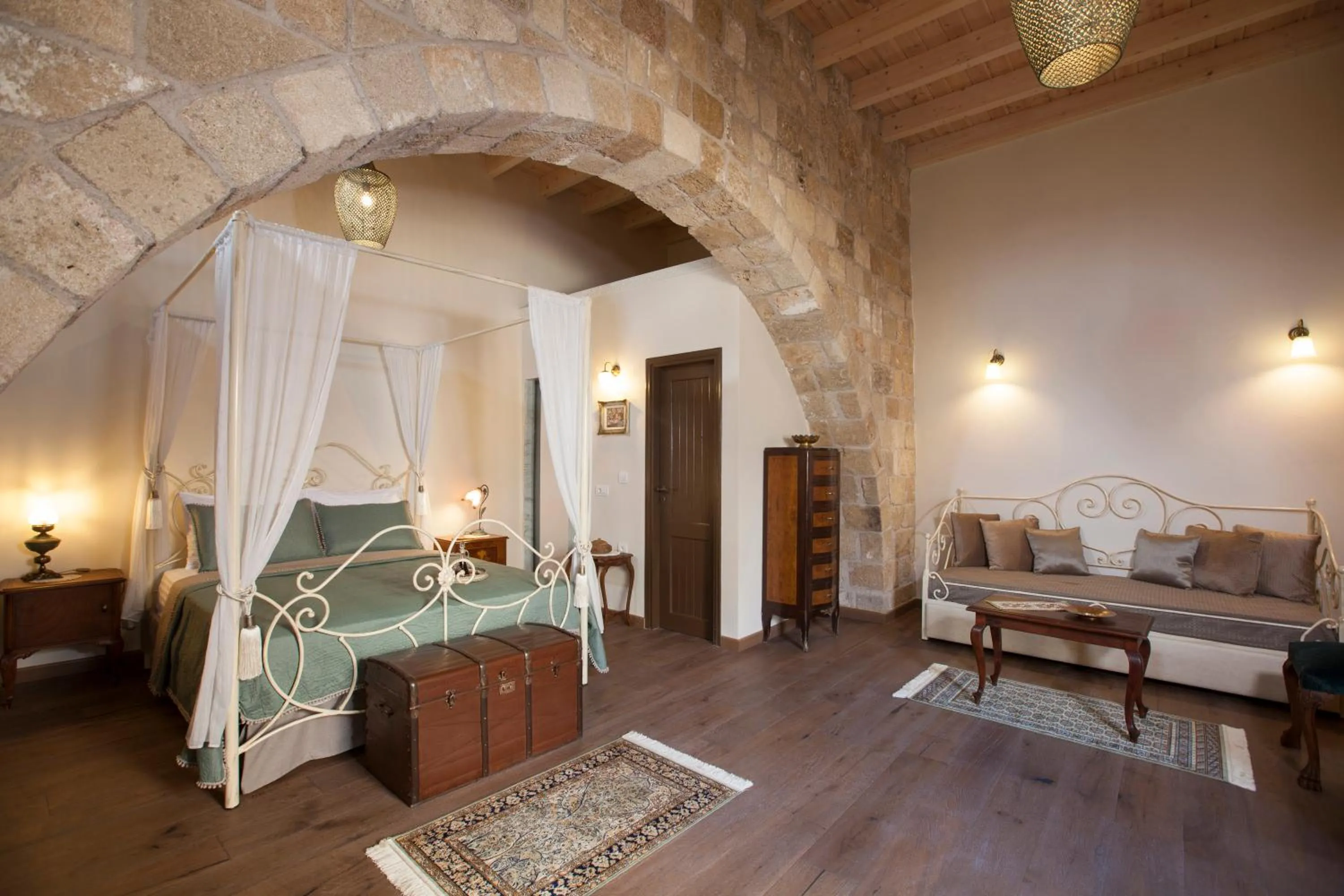 Living room, Bed in Porolithos Boutique Hotel