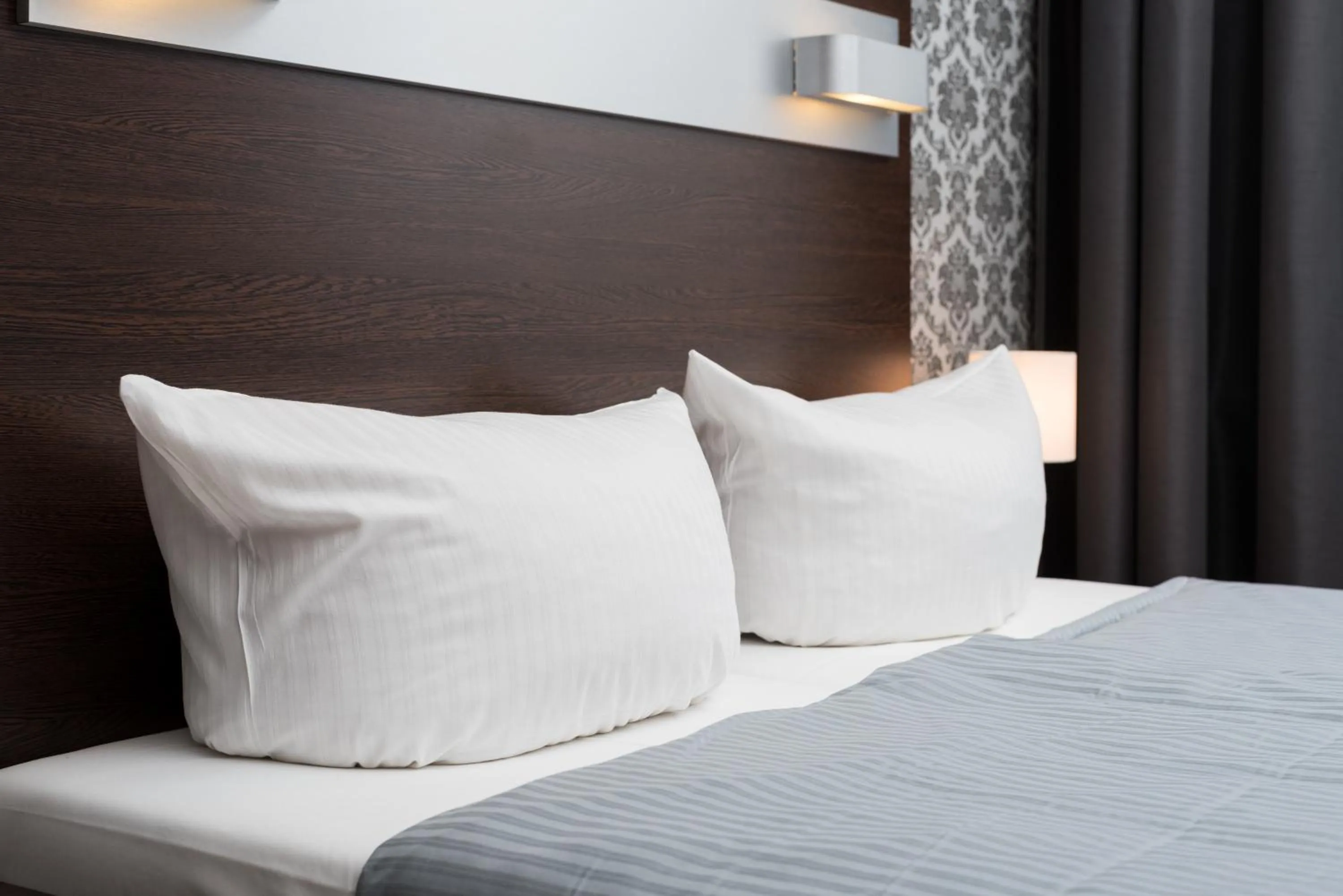 Bed in Hotel Munich Inn - Design Hotel