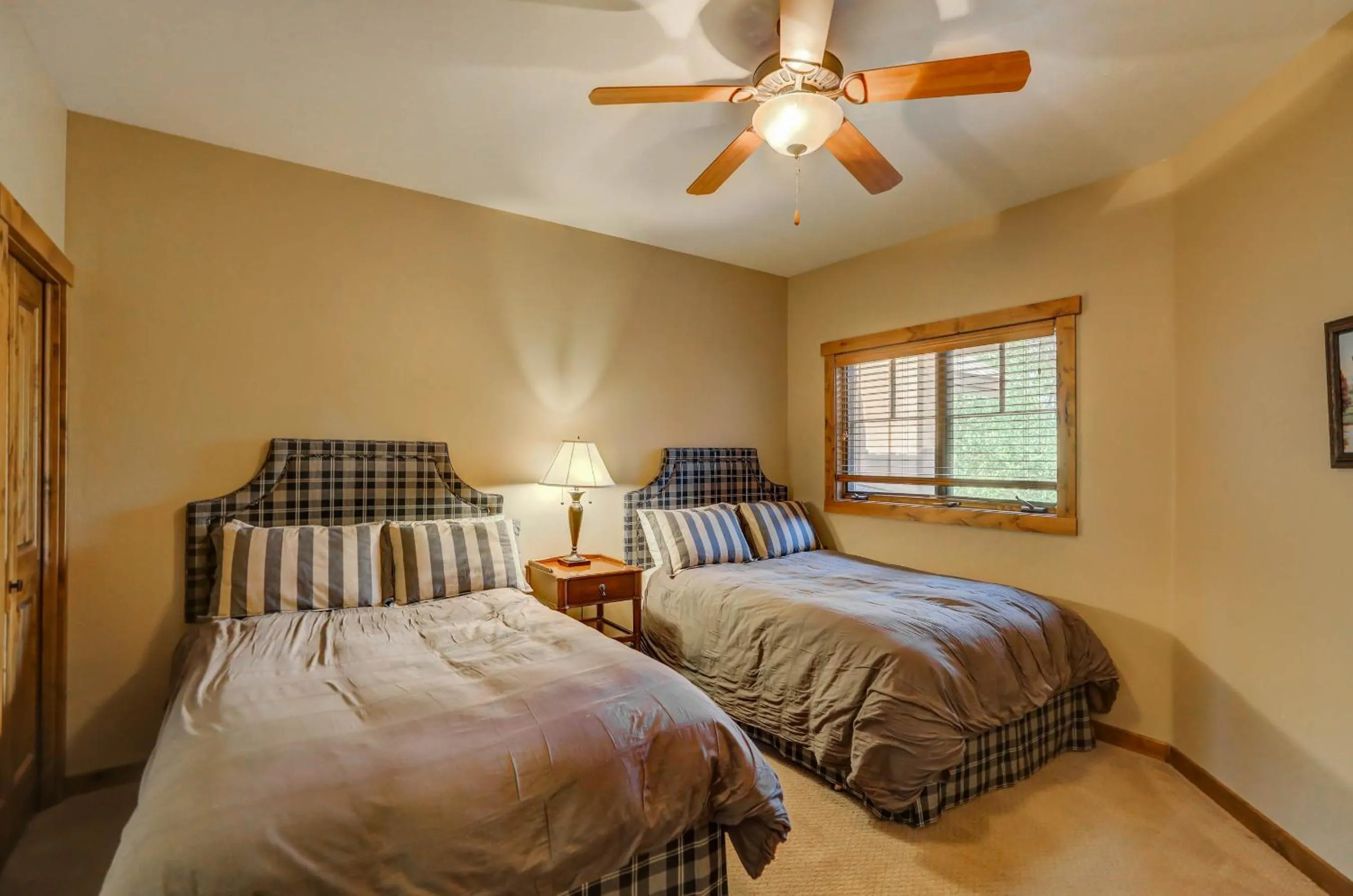 Bed in Red Tail on the River by Casago McCall - Donerightmanagement