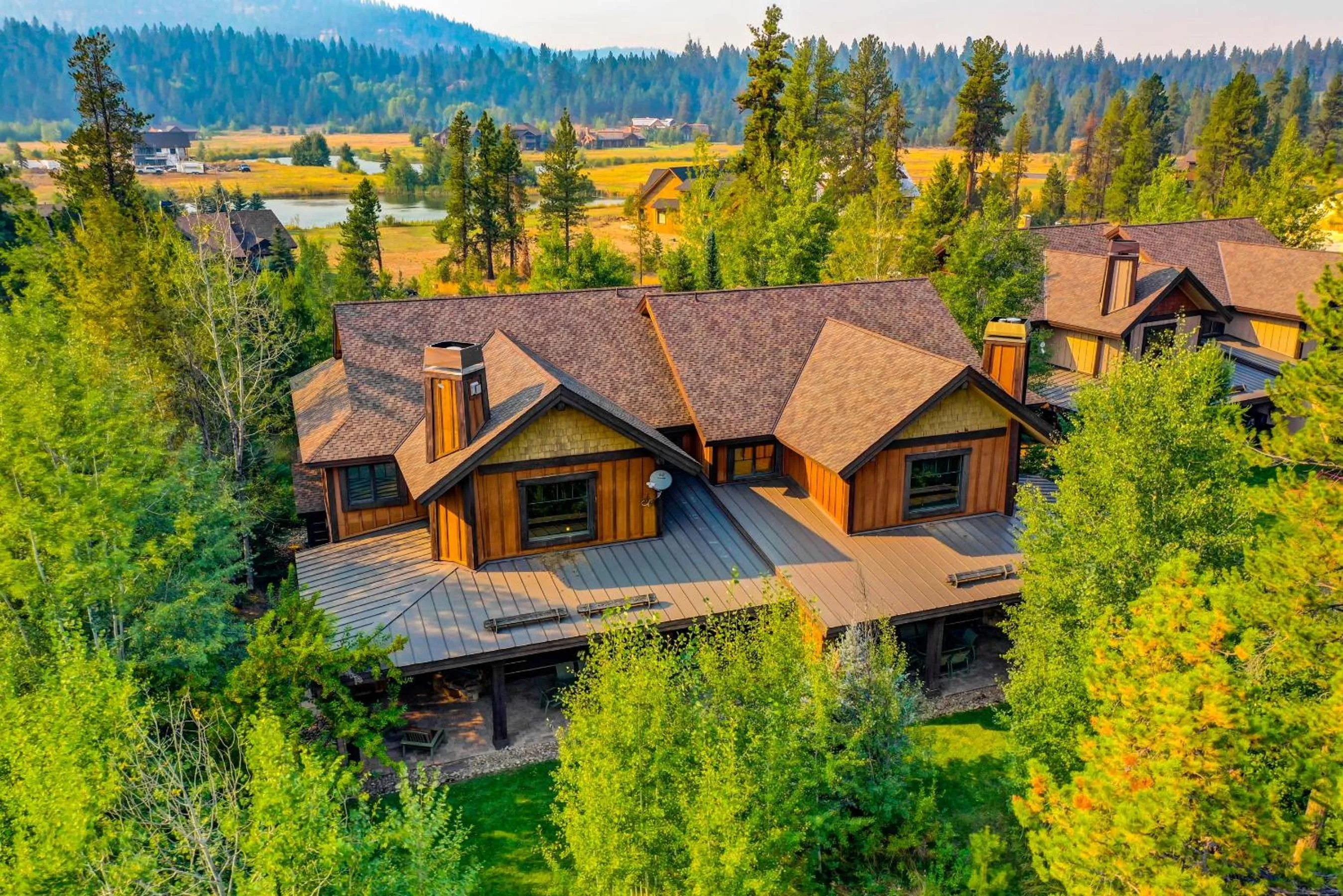 Red Tail on the River by Casago McCall - Donerightmanagement