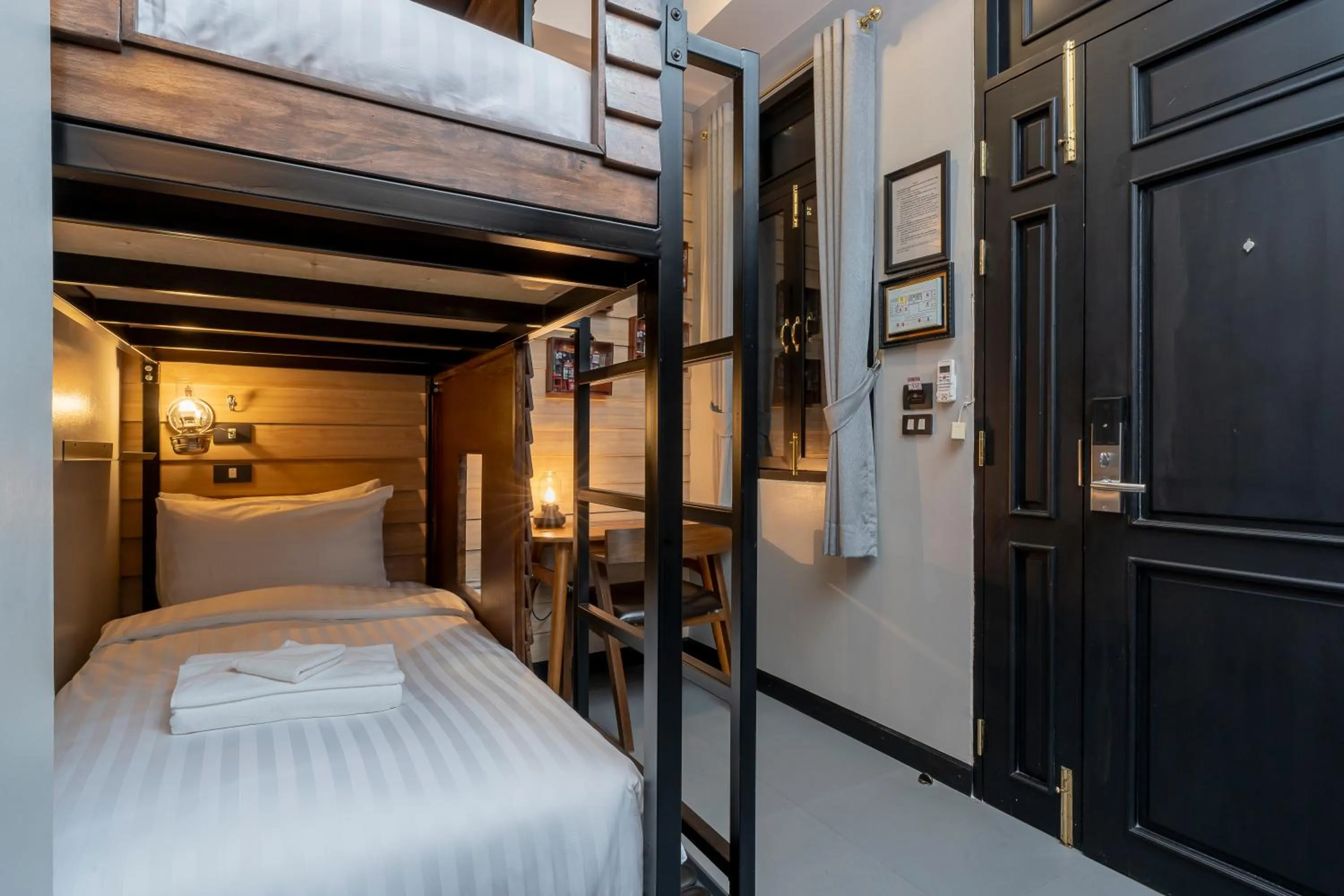 Bed in DE Phanakron Boutique Hotel