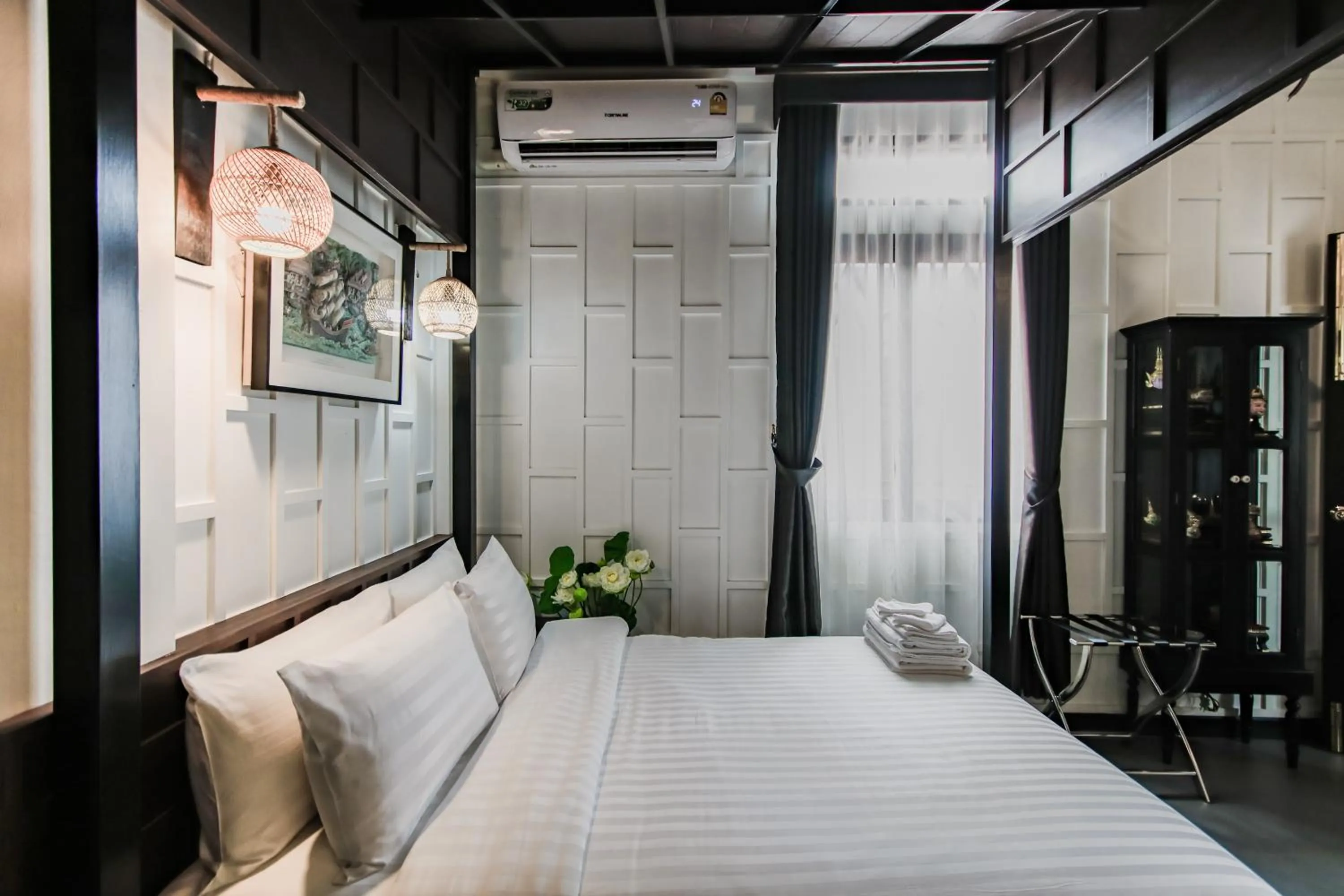 Bed in DE Phanakron Boutique Hotel