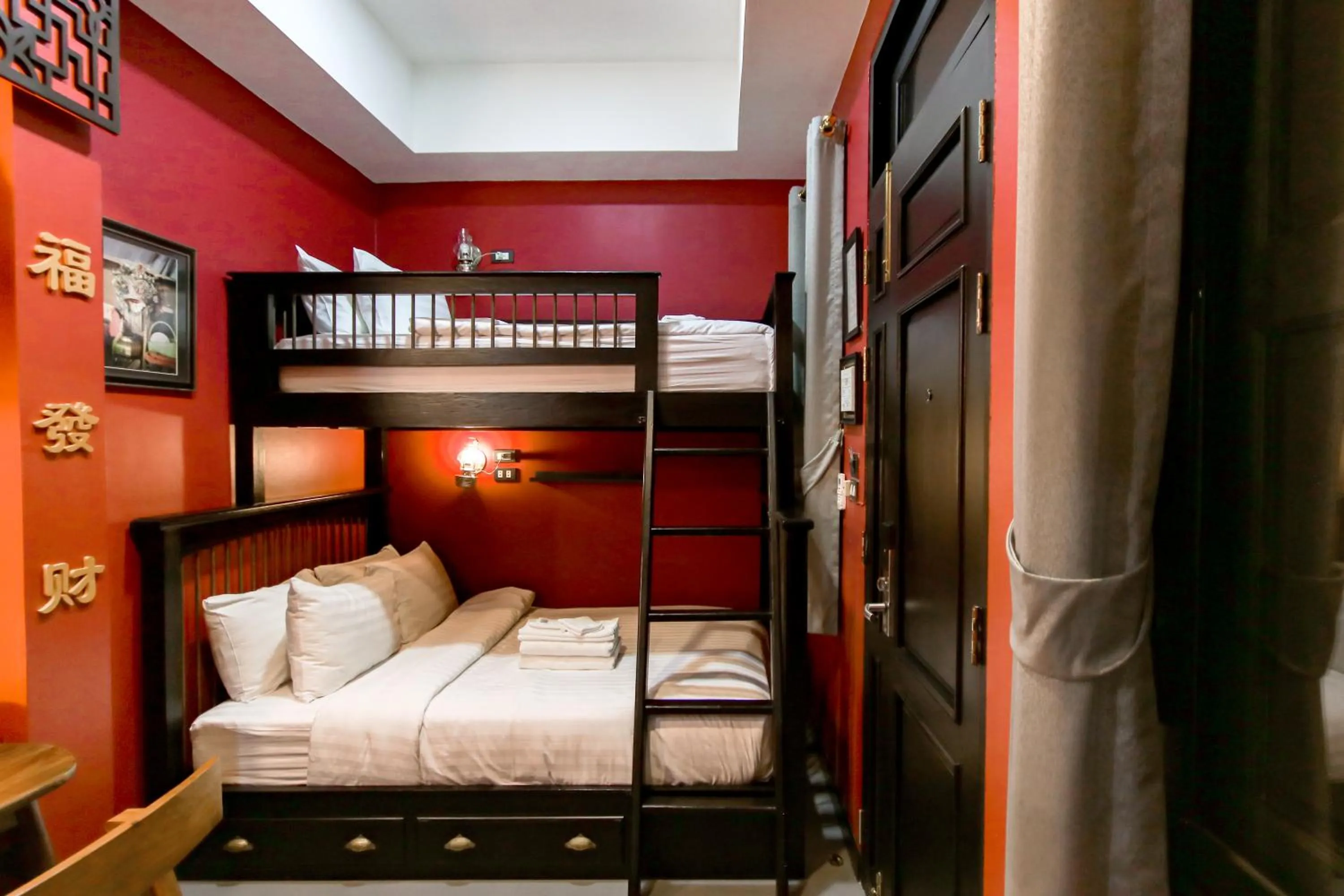 Bed in DE Phanakron Boutique Hotel