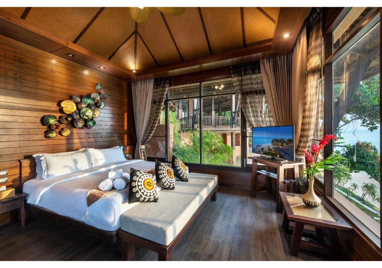 Bed in Nirvana Beach Resort, Koh Lanta SHA Extra Plus