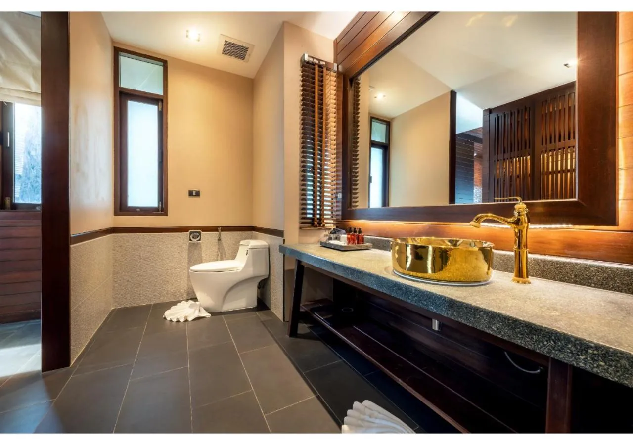 Toilet in Nirvana Beach Resort, Koh Lanta SHA Extra Plus