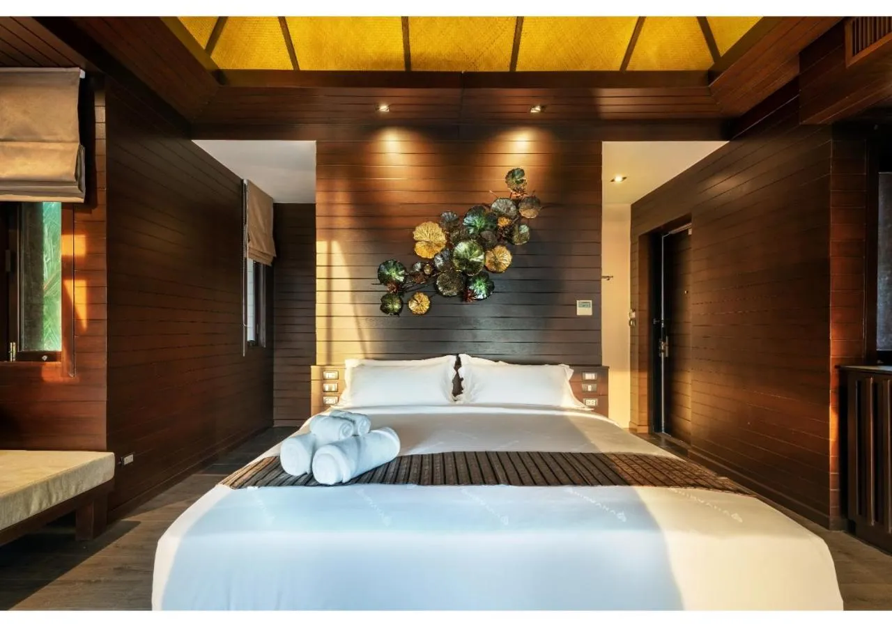 Bed in Nirvana Beach Resort, Koh Lanta SHA Extra Plus