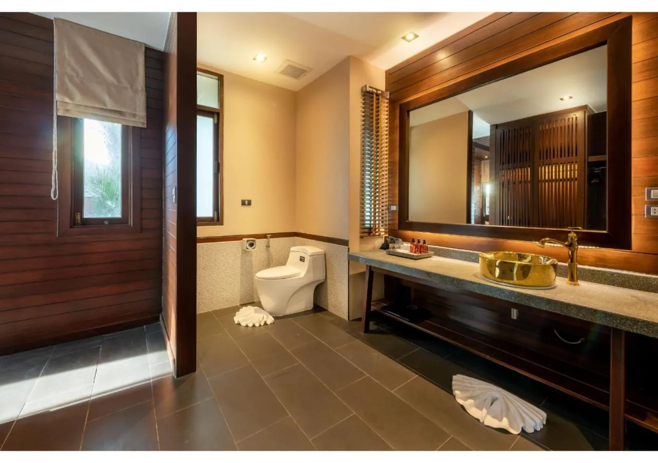 Toilet in Nirvana Beach Resort, Koh Lanta SHA Extra Plus