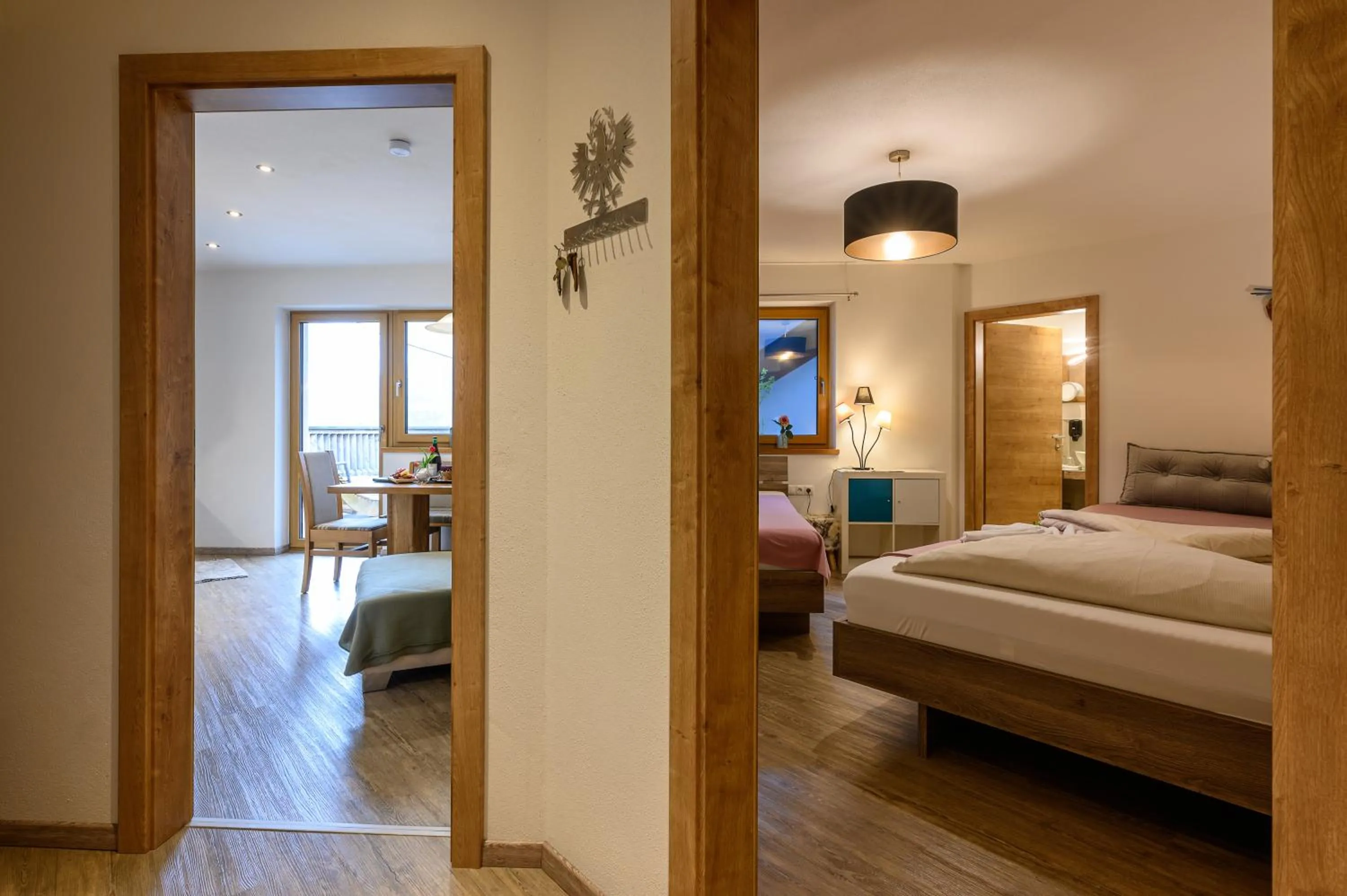 Living room, Bed in Restaurant Appartements Almdiele